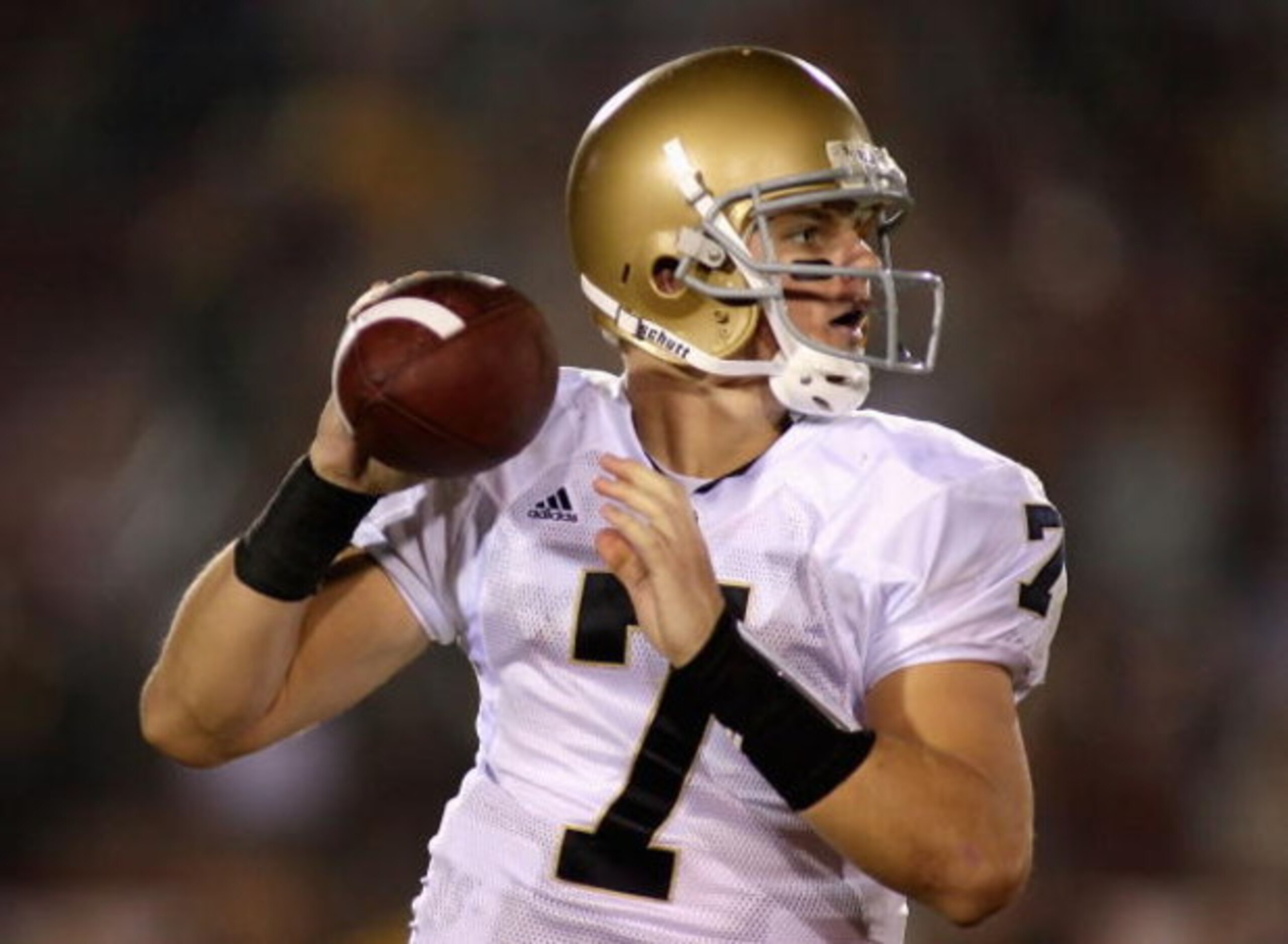 LOS ANGELES, CA - NOVEMBER 29: Quarterback Jimmy Clausen #7 of the Notre Dame Fighting Irish in action during the game against the USC Trojans at Los Angeles Memorial Coliseum on November 29, 2008 in Los Angeles, California. The Trojans defeated the Figh LOS ANGELES, CA - NOVEMBER 29: Quarterback Jimmy Clausen #7 of the Notre Dame Fighting Irish in action during the game against the USC Trojans at Los Angeles Memorial Coliseum on November 29, 2008 in Los Angeles, California. The Trojans defeated the Figh
