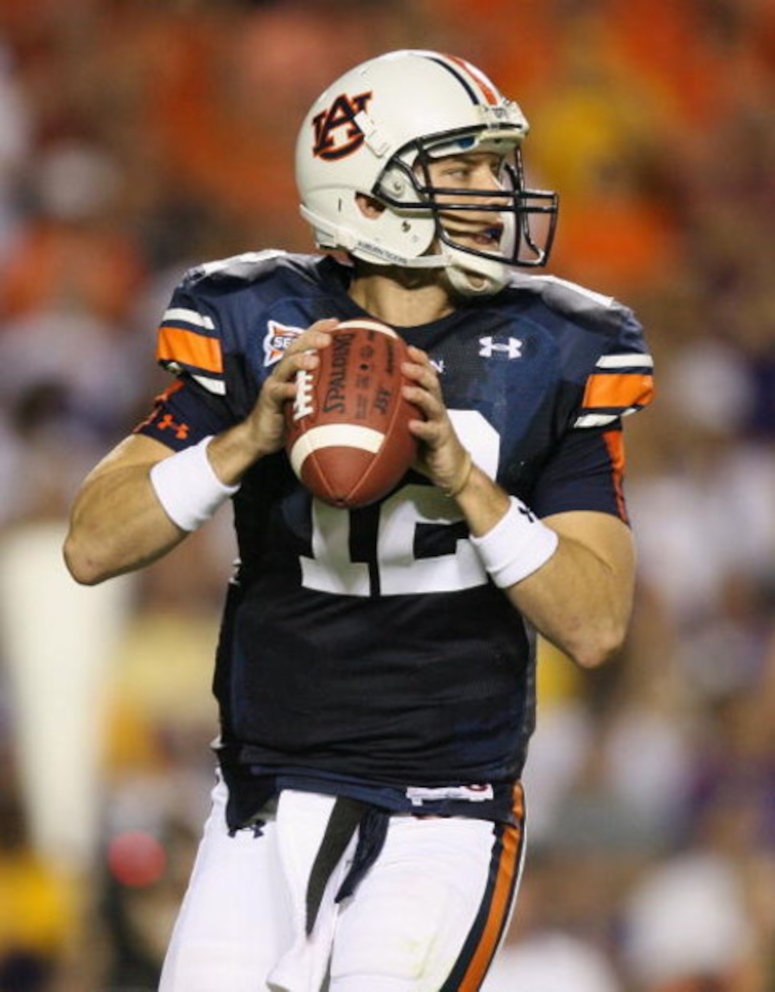 AUBURN, AL - SEPTEMBER 20: Quarterback Chris Todd #12 of the Auburn Tigers drops back to throw a pass while taking on the LSU Tigers at Jordan-Hare Stadium on September 20, 2008 in Auburn, Alabama. LSU defeated Auburn 26-21. (Photo by Doug Benc/Getty Im AUBURN, AL - SEPTEMBER 20: Quarterback Chris Todd #12 of the Auburn Tigers drops back to throw a pass while taking on the LSU Tigers at Jordan-Hare Stadium on September 20, 2008 in Auburn, Alabama. LSU defeated Auburn 26-21. (Photo by Doug Benc/Getty Im