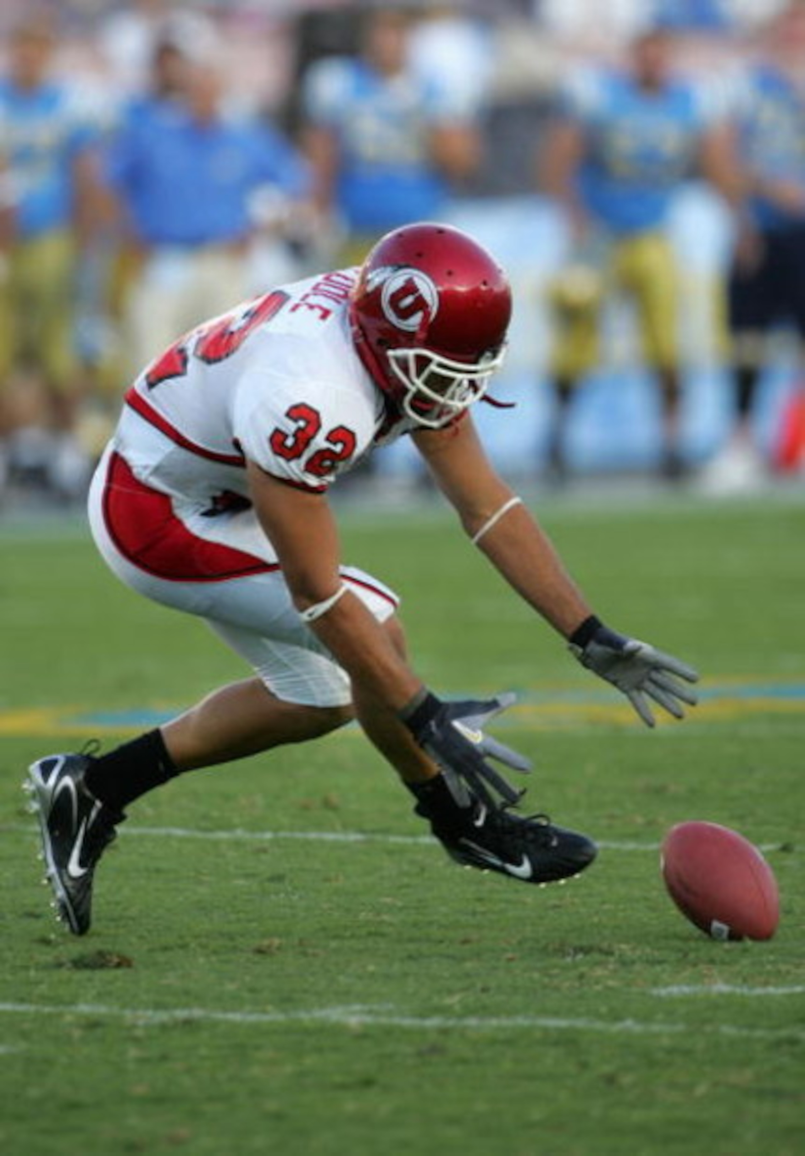 PASADENA, CA - SEPTEMBER 02: Eric Weddle #32 of the Utah Utes dives for a loose ball against the UCLA Bruins during the college football game held on Septemeber 2, 2006 at the Rose Bowl in Pasadena, California. The Bruins defeated the Utes 31-10. The Bru PASADENA, CA - SEPTEMBER 02: Eric Weddle #32 of the Utah Utes dives for a loose ball against the UCLA Bruins during the college football game held on Septemeber 2, 2006 at the Rose Bowl in Pasadena, California. The Bruins defeated the Utes 31-10. The Bru