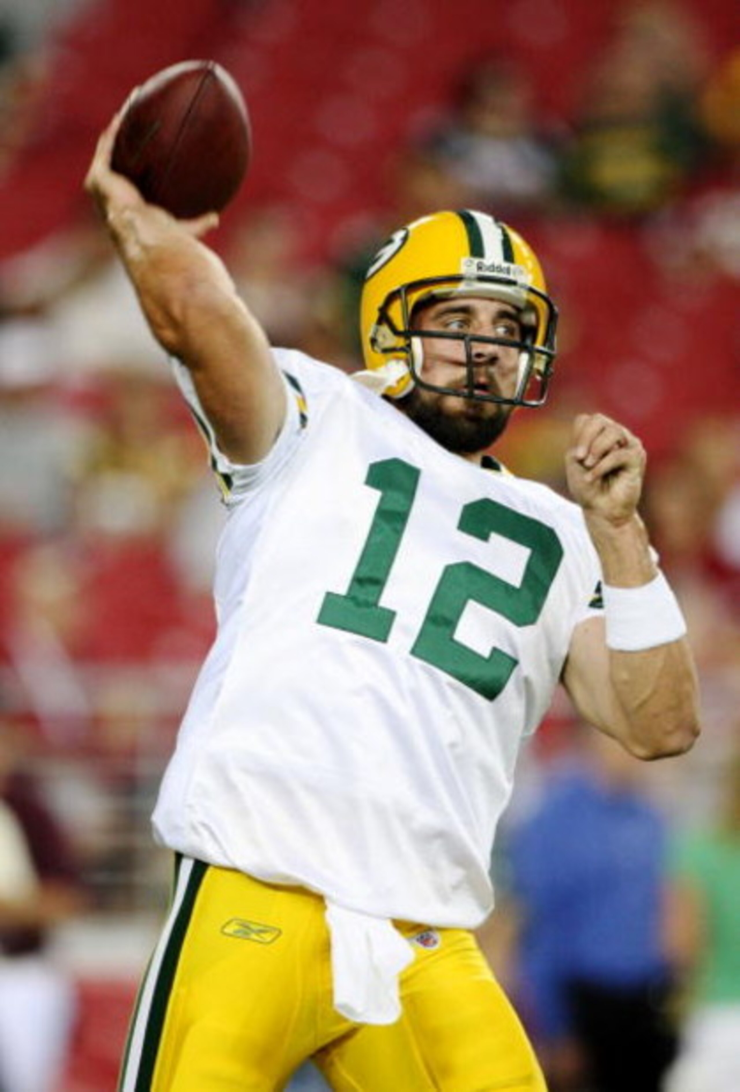 GLENDALE, AZ - AUGUST 28: Quarterback Aaron Rodgers #12 of the Green Bay Packers warms up prior to the game against the Arizona Cardinals at the University of Phoenix Stadium on August 28, 2009 in Glendale, Arizona. (Photo by Christian Petersen/Getty Im GLENDALE, AZ - AUGUST 28: Quarterback Aaron Rodgers #12 of the Green Bay Packers warms up prior to the game against the Arizona Cardinals at the University of Phoenix Stadium on August 28, 2009 in Glendale, Arizona. (Photo by Christian Petersen/Getty Im