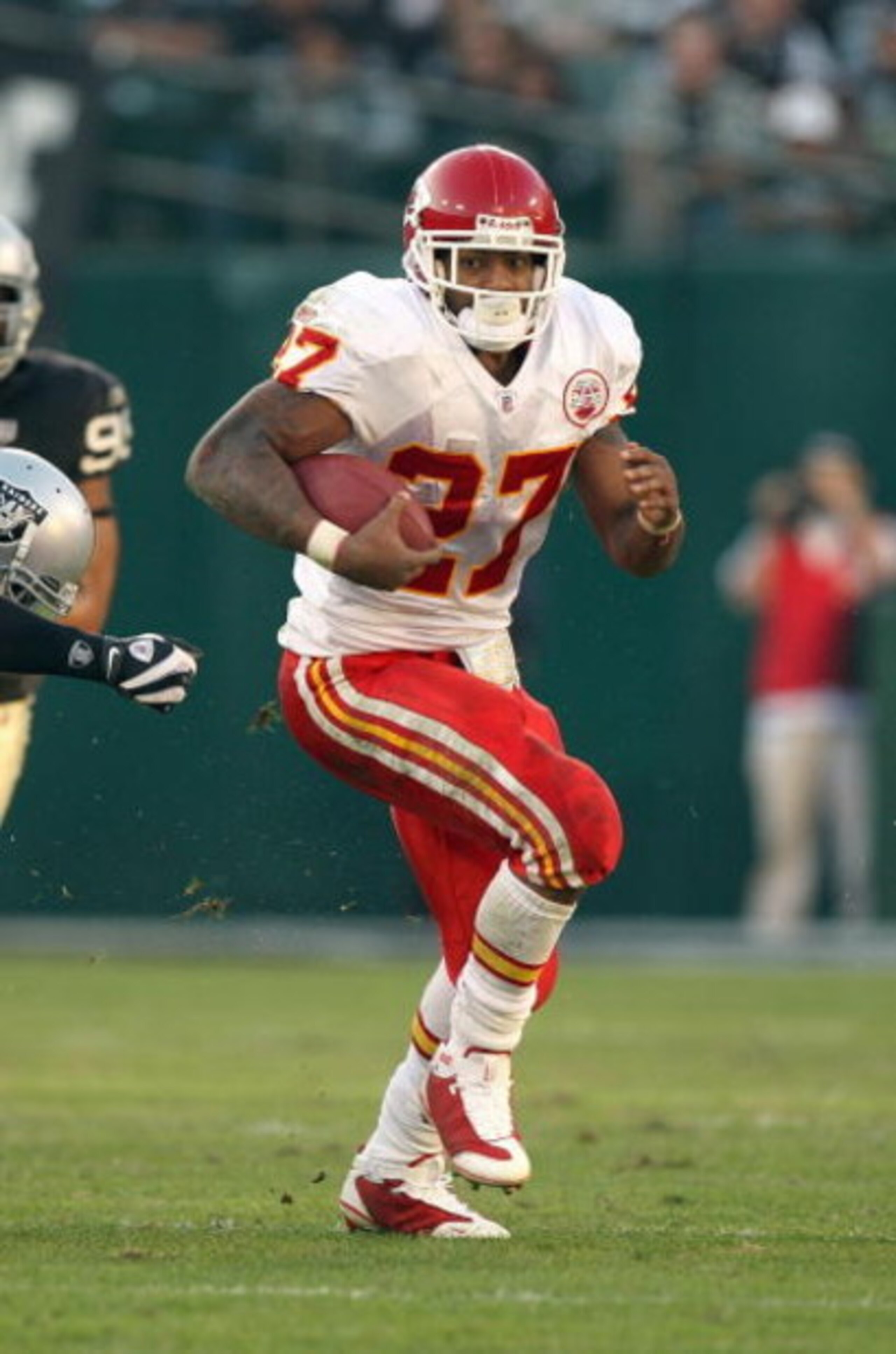 OAKLAND, CA - NOVEMBER 30: Larry Johnson #27 of the Kansas City Chiefs carries the ball against the Oakland Raiders during an NFL game on November 30, 2008 at the Oakland-Alameda County Coliseum in Oakland, California. (Photo by Jed Jacobsohn/Getty Image OAKLAND, CA - NOVEMBER 30: Larry Johnson #27 of the Kansas City Chiefs carries the ball against the Oakland Raiders during an NFL game on November 30, 2008 at the Oakland-Alameda County Coliseum in Oakland, California. (Photo by Jed Jacobsohn/Getty Image