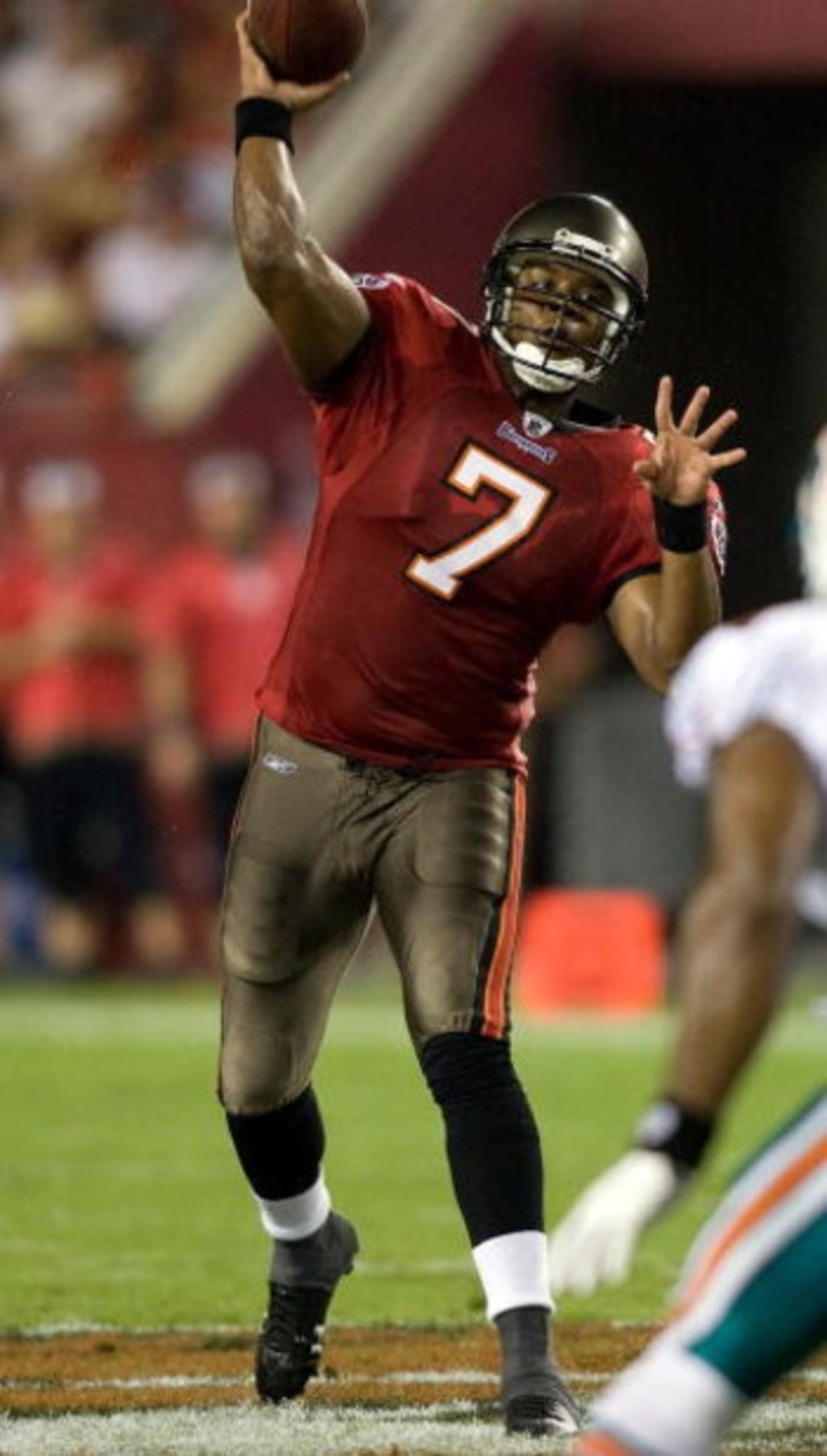 TAMPA, FL - AUGUST 27: Quarteback Byron Leftwich #7 of the Tampa Bay Buccaneers looks for an open receiver against the Miami Dolphins during a preseason game at Raymond James Stadium on August 27, 2009 in Tampa, Florida. (Photo by J. Meric/Getty Images) TAMPA, FL - AUGUST 27: Quarteback Byron Leftwich #7 of the Tampa Bay Buccaneers looks for an open receiver against the Miami Dolphins during a preseason game at Raymond James Stadium on August 27, 2009 in Tampa, Florida. (Photo by J. Meric/Getty Images)
