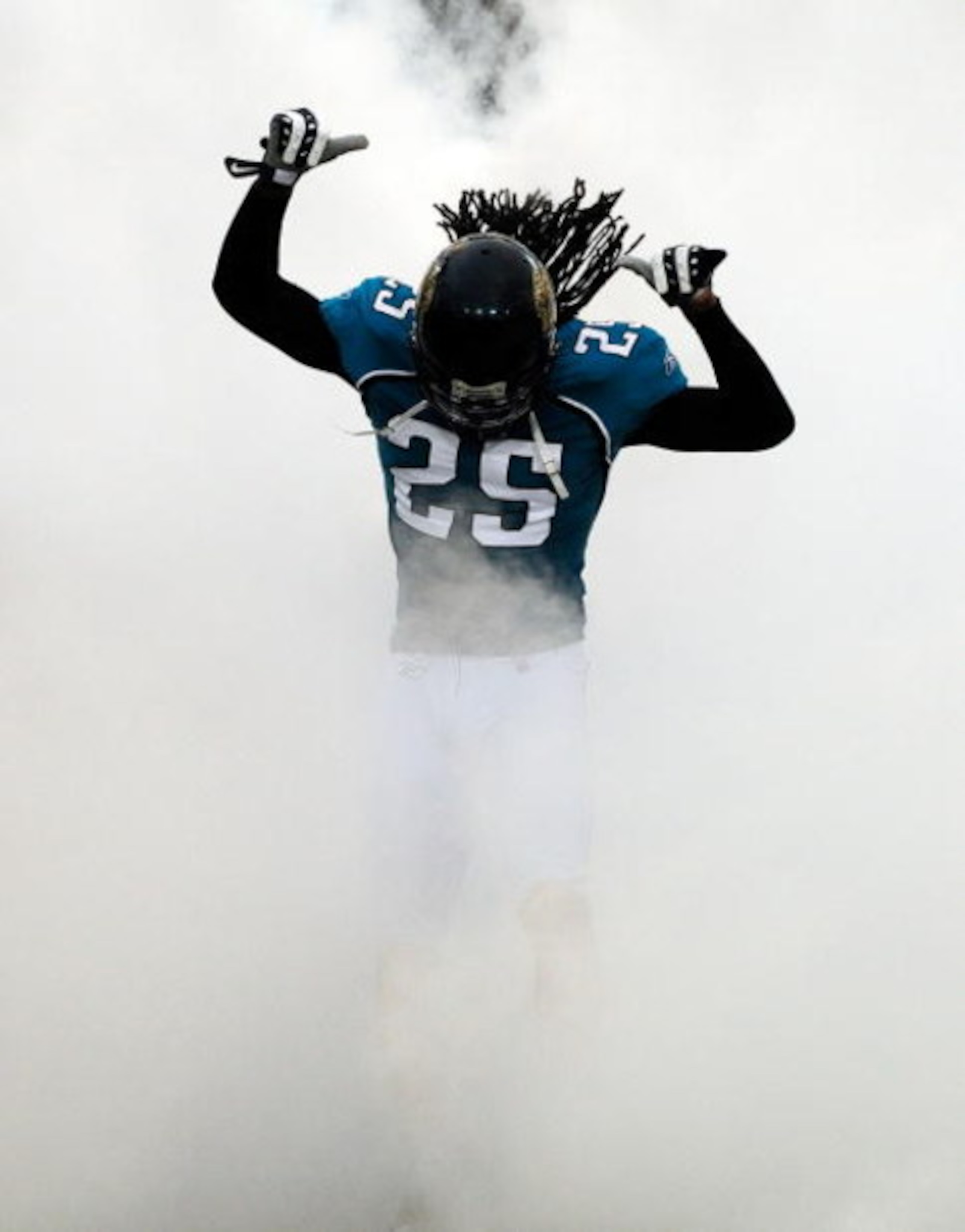 JACKSONVILLE, FL - SEPTEMBER 03:  Reggie Nelson #25 of the Jacksonville Jaguars makes an entrance to the stadium during the game against the Washington Redskins at Jacksonville Municipal Stadium on September 3, 2009 in Jacksonville, Florida.  (Photo by Sa
