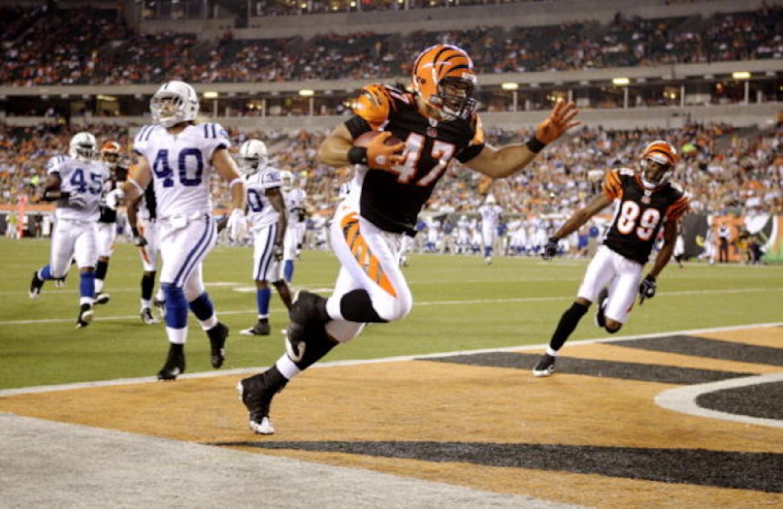 CINCINNATI, OH - AUGUST 3:  Kolo Kapanui #47 of the Cincinnati Bengals scores a touchdown during the preseason game against the Indianapolis Colts on August 3, 2009 at Paul Brown Stadium in Cincinnati, Ohio.  (Photo by Andy Lyons/Getty Images)