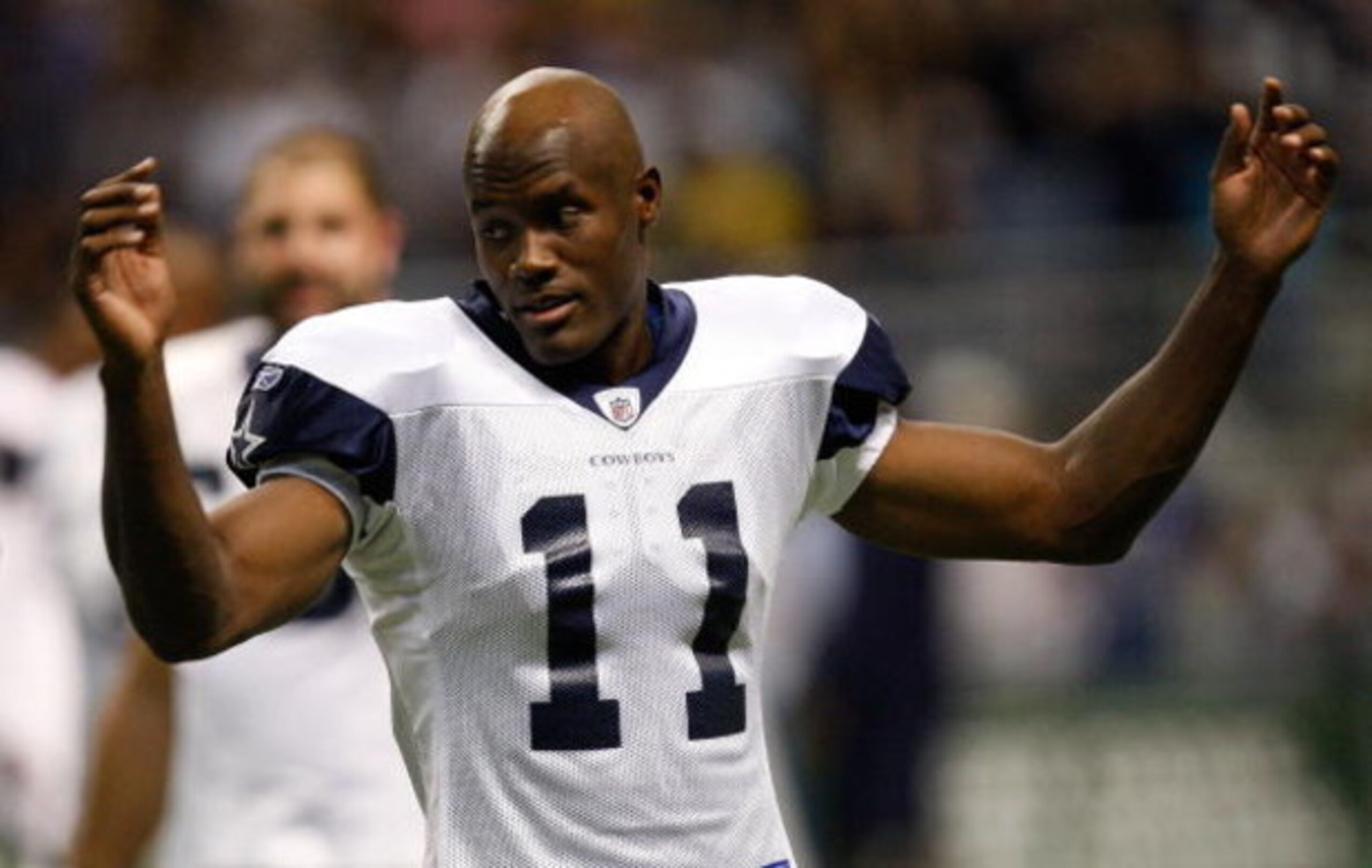SAN ANTONIO - AUGUST 06:  Wide receiver Roy Williams #11 of the Dallas Cowboys during training camp at the Alamodome on August 6, 2009 in San Antonio, Texas.  (Photo by Ronald Martinez/Getty Images)