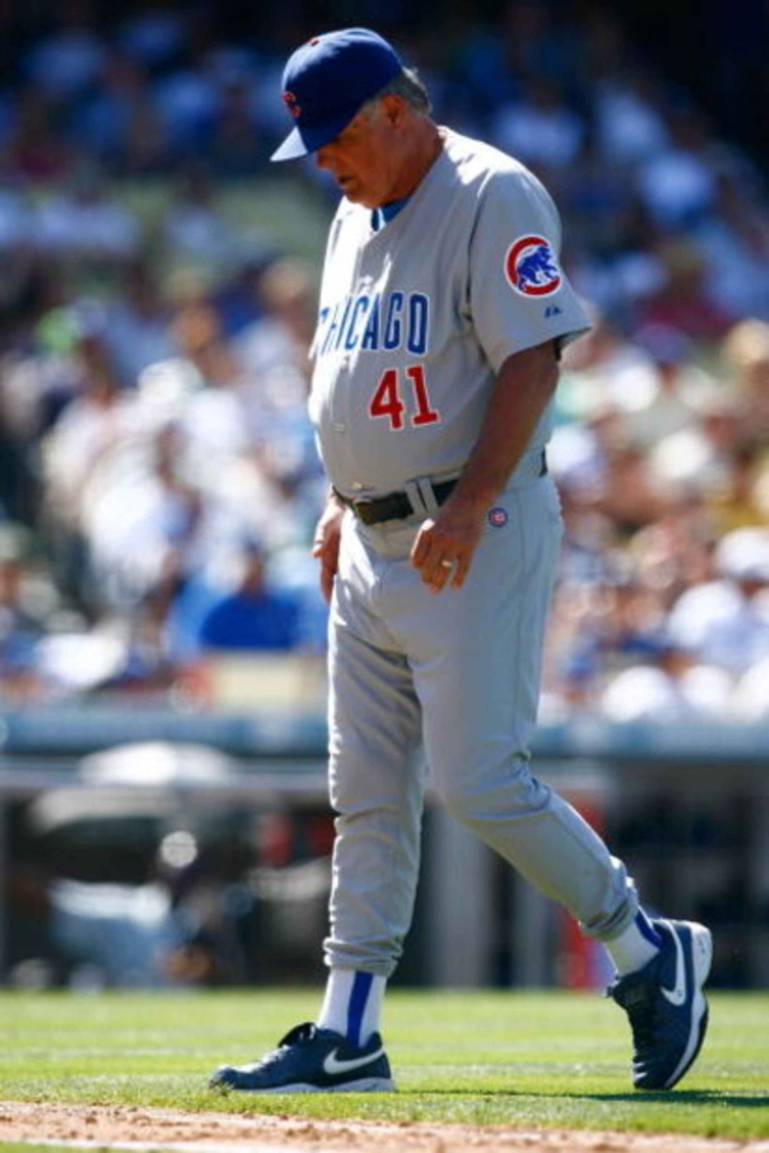 LOS ANGELES, CA - AUGUST 23:  Chicago Cubs manager Lou Piniella walks back to the dugout against the Los Angeles Dodgers at Dodger Stadium on August 23, 2009 in Los Angeles, California. The Cubs defeated the Dodgers 3-1.  (Photo by Jeff Gross/Getty Images