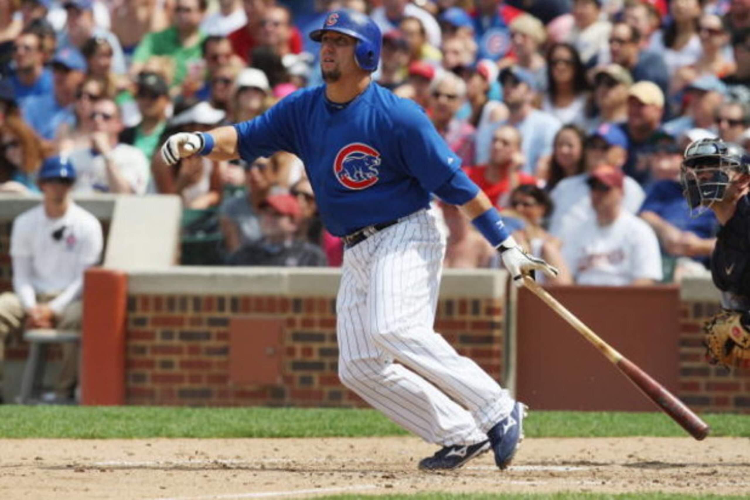 CHICAGO - JULY 03:  Jake Fox #5 of the Chicago Cubs at bat against the Milwaukee Brewers during their MLB game on July 3, 2009 at Wrigley Field in Chicago, Illinois. (Photo by Jonathan Daniel/Getty Images) 
