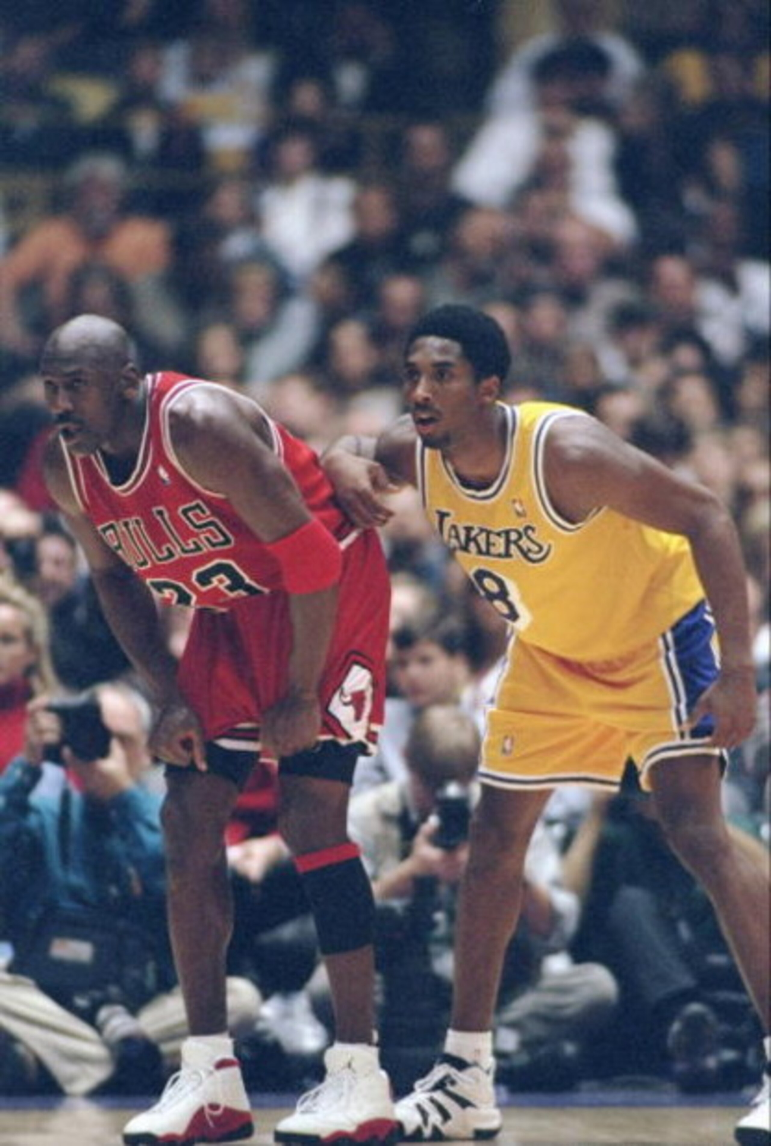 1 Feb 1998:  Guard Michael Jordan of the Chicago Bulls (left) and guard Kobe Bryant of the Los Angeles Lakers look on during a game at the Great Western Forum in Inglewood, California.  The Lakers won the game, 112-87. Mandatory Credit: Jed Jacobsohn  /Al