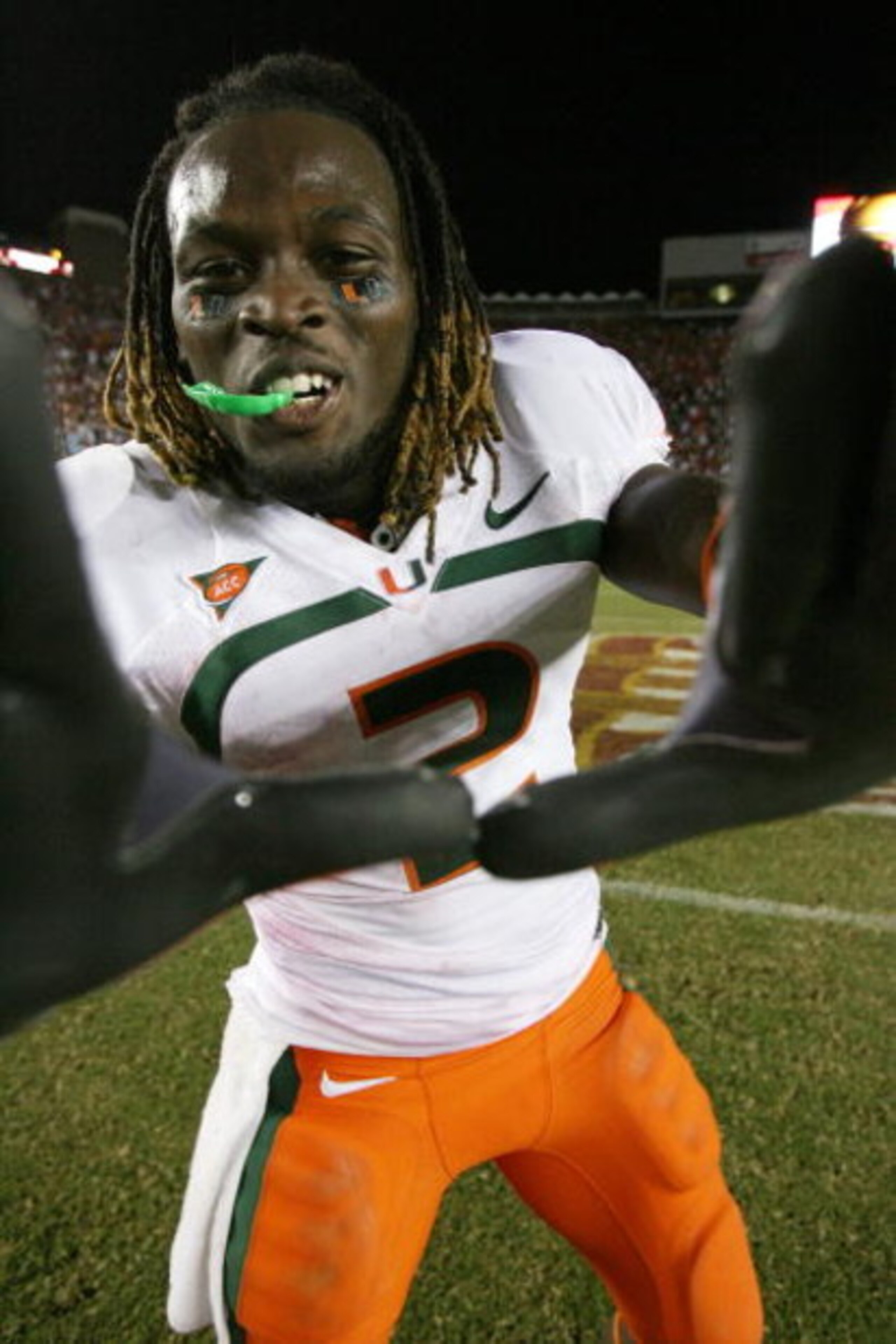 TALLAHASSEE, FL - SEPTEMBER 07:  Running back Graig Cooper #2 of the Miami Hurricanes celebrates after defeating the Florida State Seminoles at Doak Campbell Stadium on September 7, 2009 in Tallahassee, Florida. Miami defeated Florida State 38-34.  (Photo