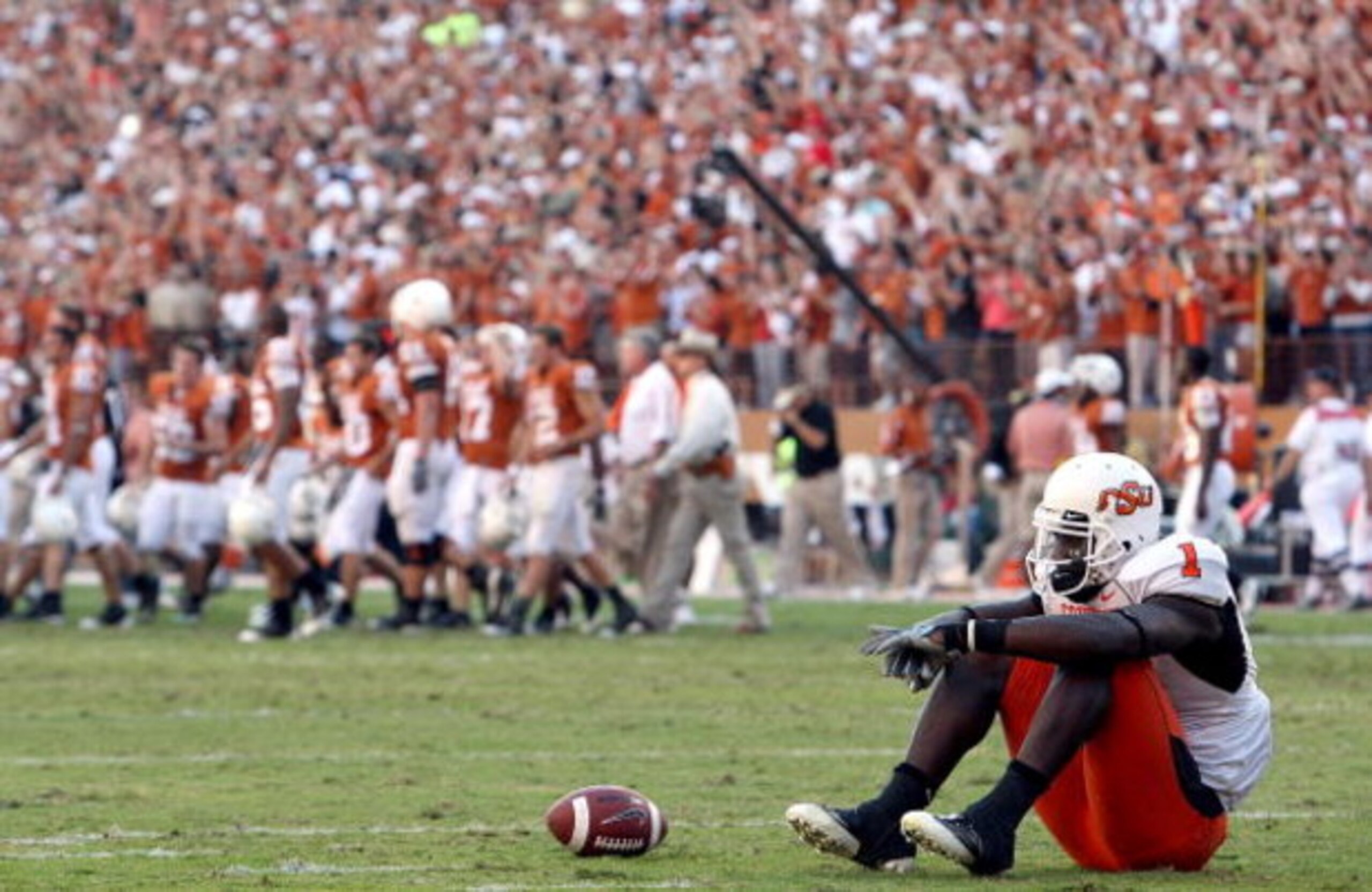 AUSTIN, TX - OCTOBER 25:  Wide receiver Dez Bryant #1 of the Oklahoma State Cowboys reacts after 24-28 loss against the Texas Longhorns at Texas Memorial Stadium on October 25, 2008 in Austin, Texas.  (Photo by Ronald Martinez/Getty Images)