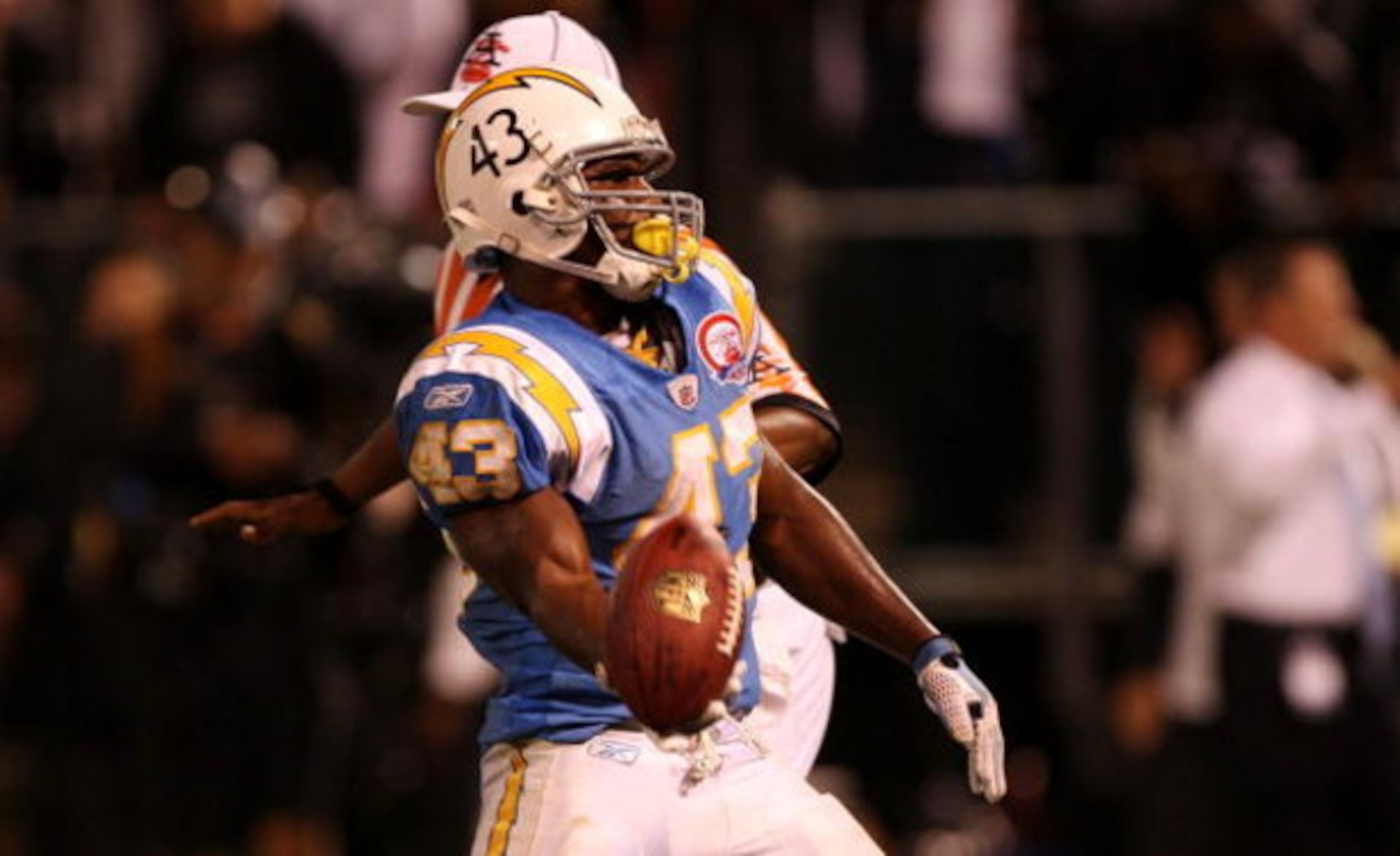 OAKLAND, CA - SEPTEMBER 14:  Darren Sproles #43 of the San Diego Chargers celebrates after he scored the game-winning touchdown on a 5-yard run in the fourth quarter against the Oakland Raiders on September 14, 2009 at the Oakland-Alameda County Coliseum 