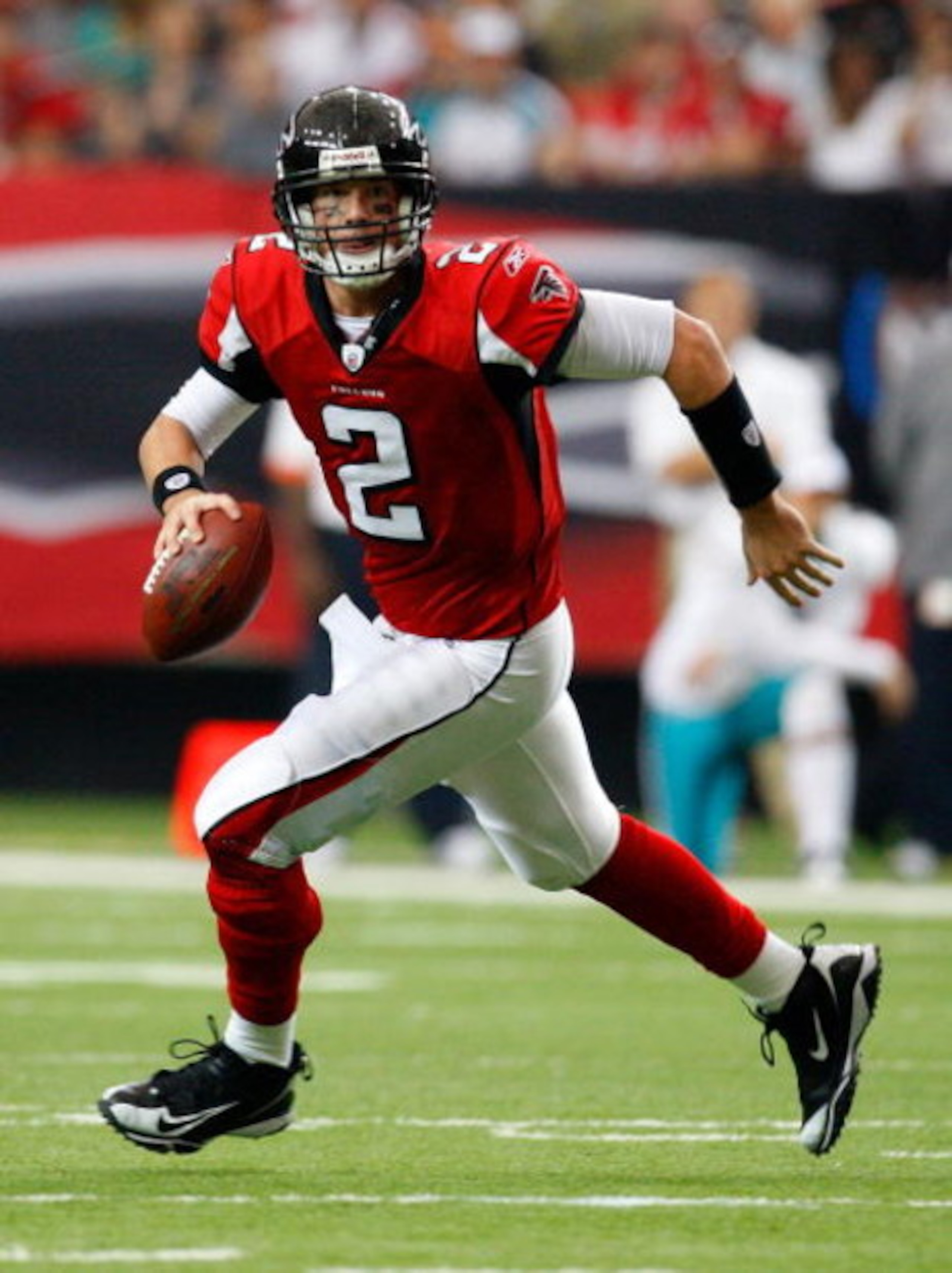 ATLANTA - SEPTEMBER 13:  Quarterback Matt Ryan #2 of the Atlanta Falcons rolls out against the Miami Dolphins at Georgia Dome on September 13, 2009 in Atlanta, Georgia.  (Photo by Kevin C. Cox/Getty Images)