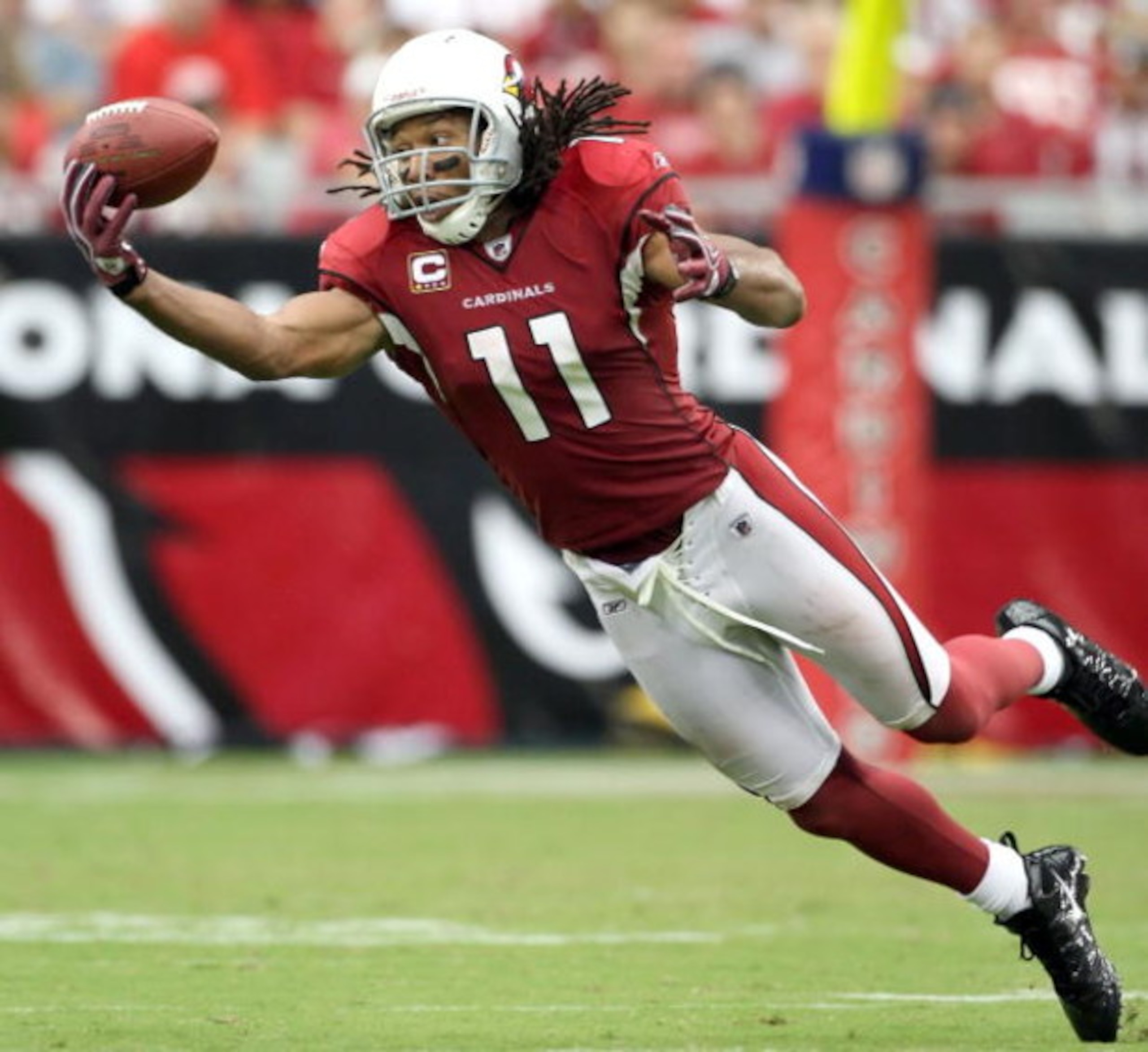 GLENDALE, AZ - SEPTEMBER 13:  Wide receiver Larry Fitzgerald #11 of the Arizona Cardinals is unable to catch a pass during the NFL game against the San Francisco 49ers at the Universtity of Phoenix Stadium on September 13, 2009 in Glendale, Arizona. The 4