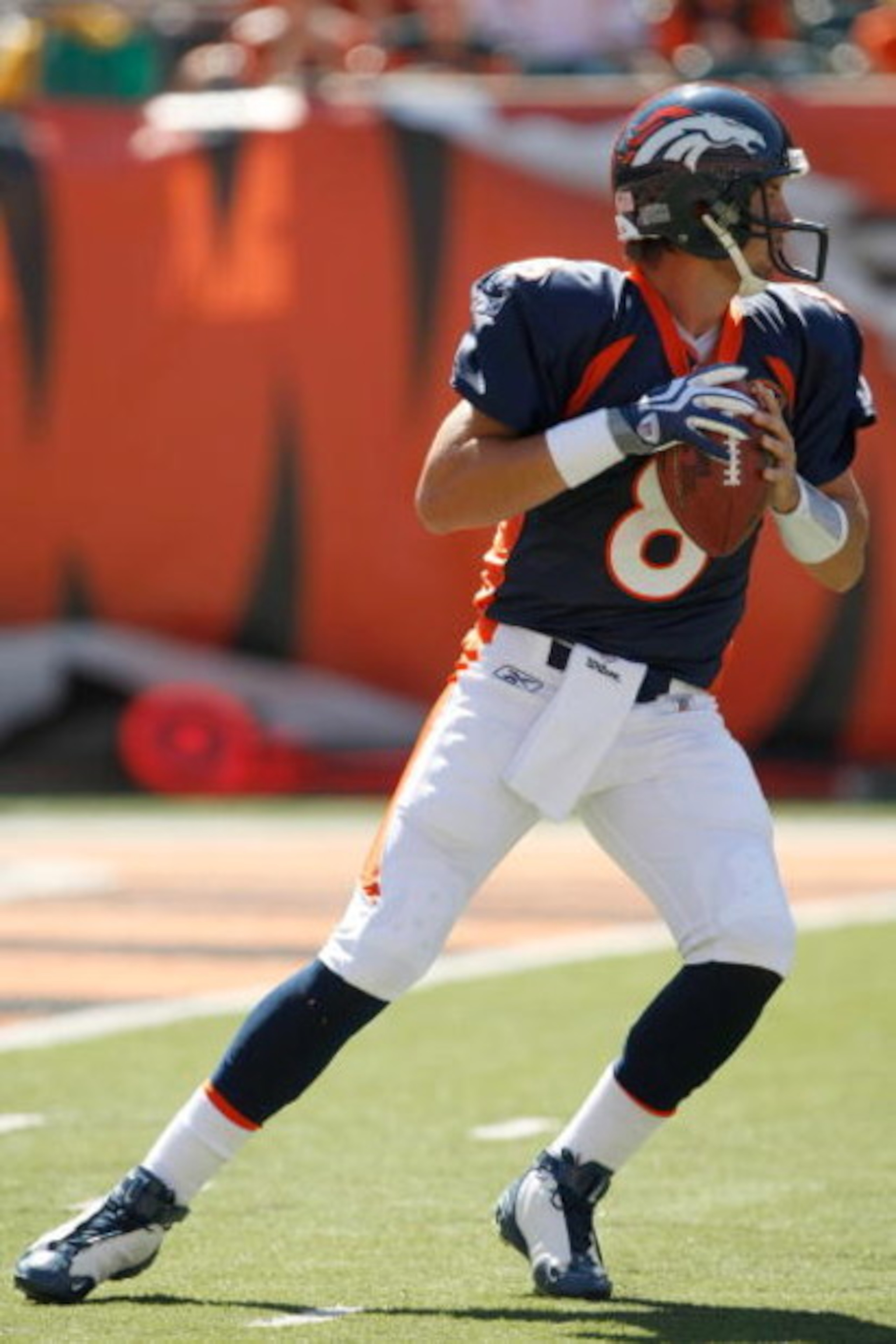 CINCINNATI, OH - SEPTEMBER 13:  Quarterback Kyle Orton #8 of the Denver Broncos drops back to pass the football against the Cincinnati Bengals at Paul Brown Stadium on September 13, 2009 in Cincinnati, Ohio. The Broncos defeated the Bengals 12-7. (Photo b