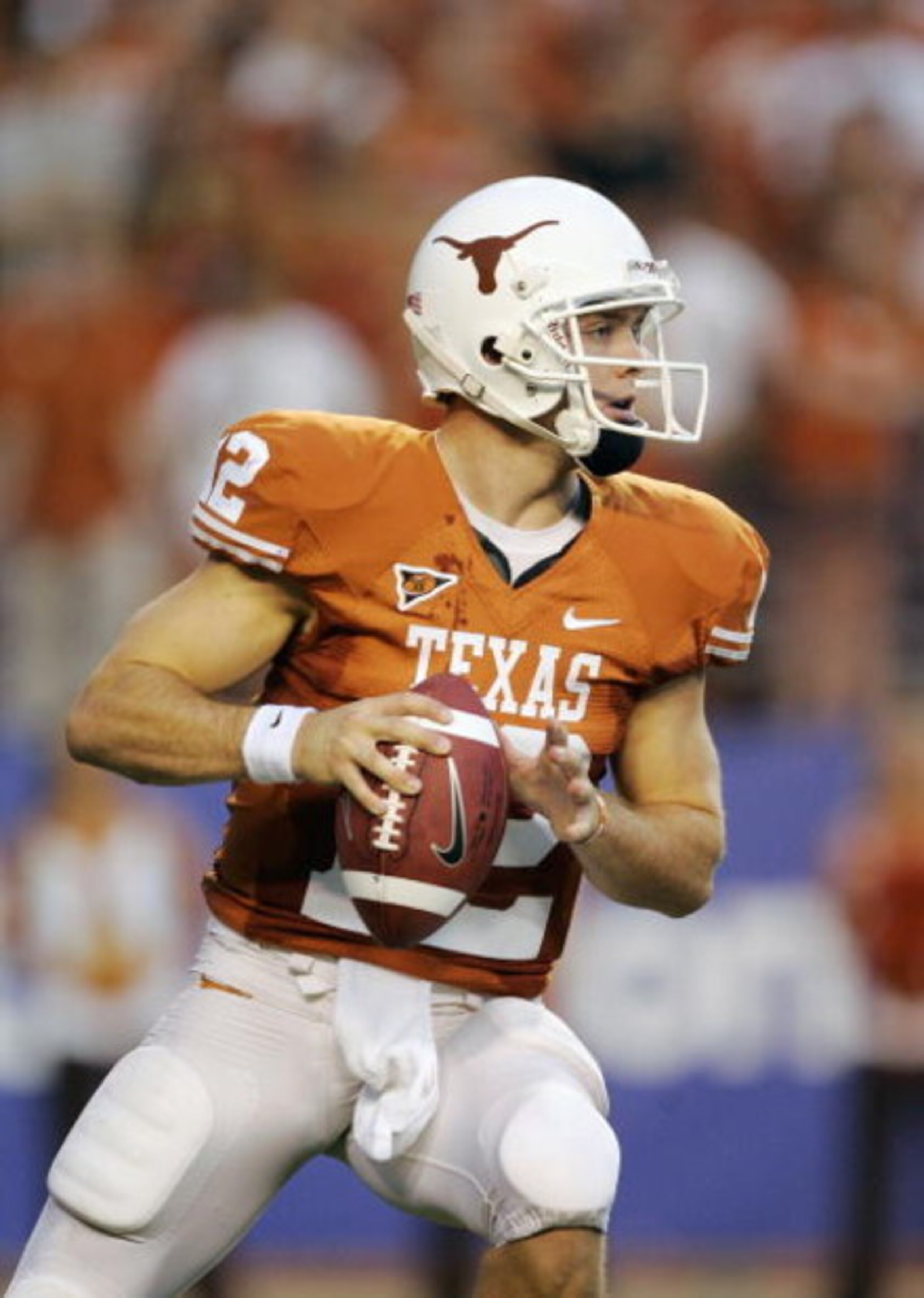 AUSTIN, TX - SEPTEMBER 5: Quarterback Colt McCoy #12 of the Texas Longhorns drops back in the pocket and looks for an open receiver during their game against the Louisiana Monroe Warhawks on September 5, 2009 at Darrell K Royal-Texas Memorial Stadium in AUSTIN, TX - SEPTEMBER 5: Quarterback Colt McCoy #12 of the Texas Longhorns drops back in the pocket and looks for an open receiver during their game against the Louisiana Monroe Warhawks on September 5, 2009 at Darrell K Royal-Texas Memorial Stadium in