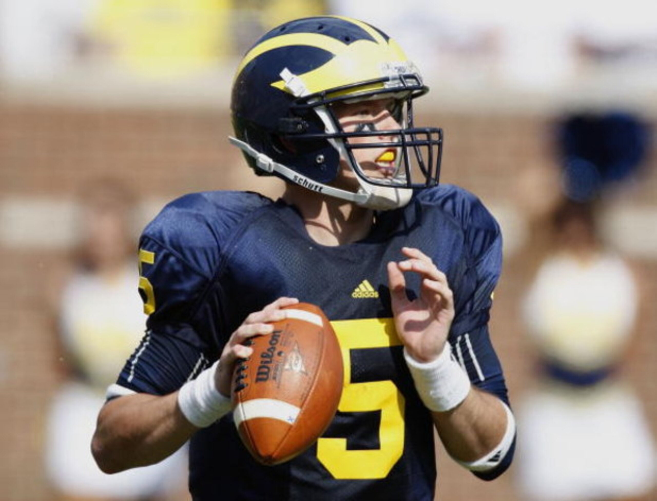 ANN ARBOR, MI - SEPTEMBER 05:  Tate Forcier #5 of the Michigan Wolverines gets ready to throw a second quarter pass while playing the Western Michigan Broncos on September 5, 2009 at Michigan Stadium in Ann Arbor, Michigan.  (Photo by Gregory Shamus/Getty