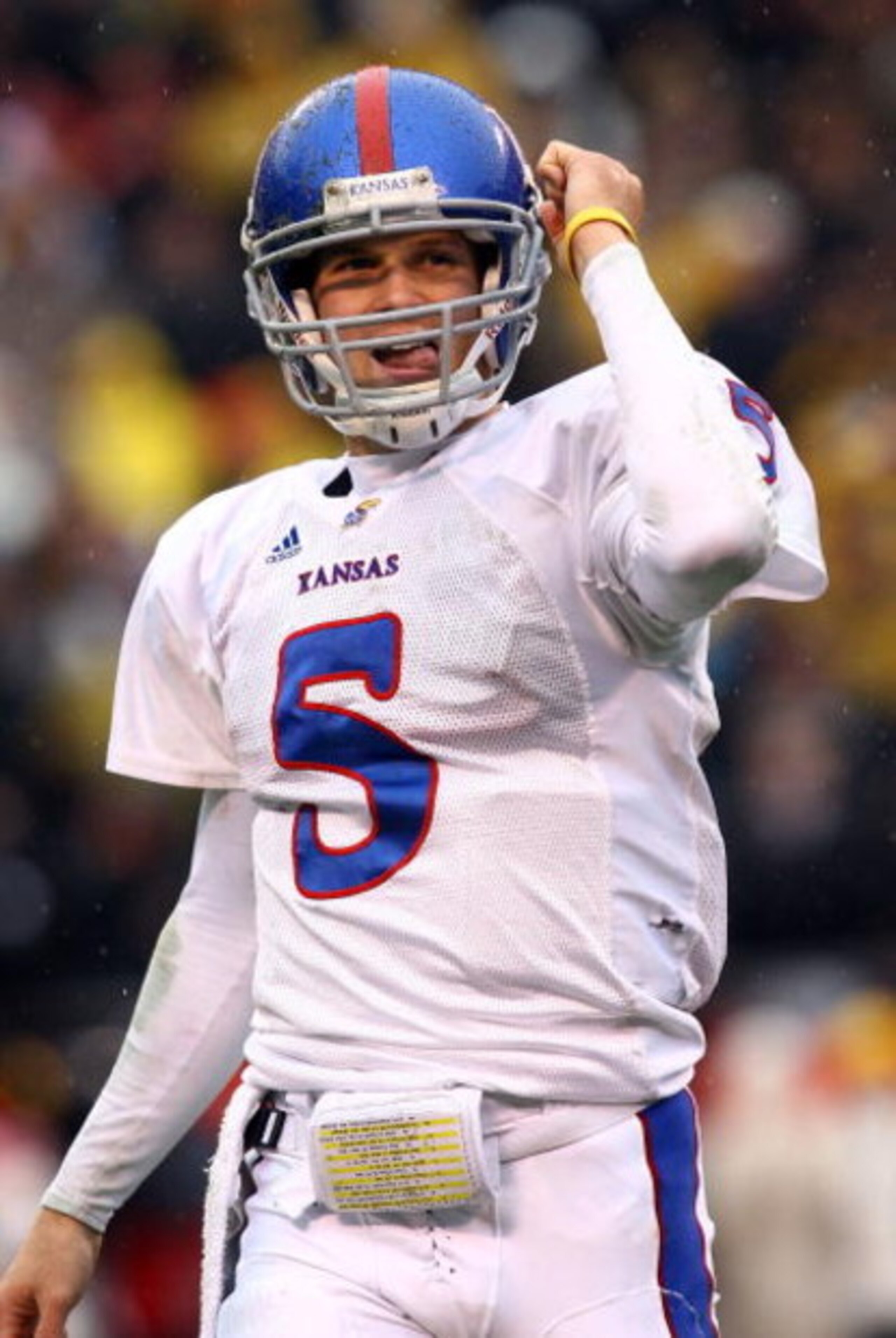 KANSAS CITY, MO - NOVEMBER 29: Quarterback Todd Reesing #5 of the Kansas Jayhawks celebrates after a touchdown during the first half of the game against the Missouri Tigers on November 29, 2008 at Arrowhead Stadium in Kansas City, Missouri. (Photo by J KANSAS CITY, MO - NOVEMBER 29: Quarterback Todd Reesing #5 of the Kansas Jayhawks celebrates after a touchdown during the first half of the game against the Missouri Tigers on November 29, 2008 at Arrowhead Stadium in Kansas City, Missouri. (Photo by J