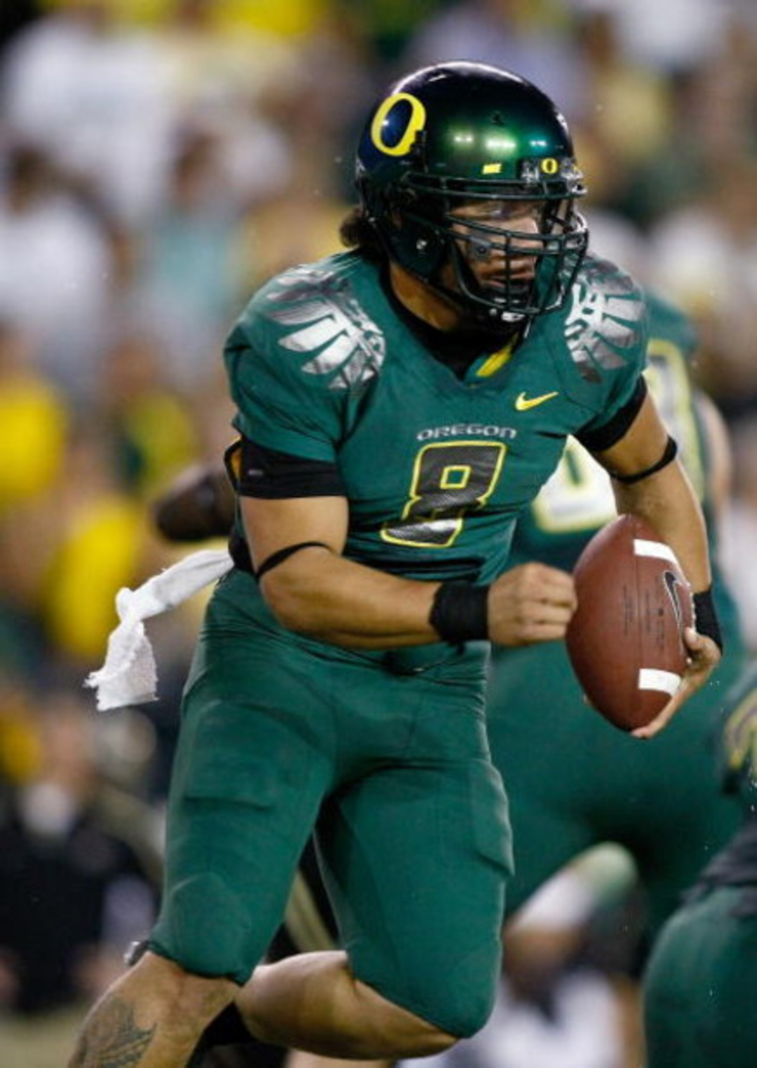 EUGENE, OR - SEPTEMBER 12: Quarterback Jeremiah Masoli #8 of the Oregon Ducks runs with the ball against the Purdue Boilermakers at Autzen Stadium on September 12, 2009 in Eugene, Oregon. (Photo by Jonathan Ferrey/Getty Images) EUGENE, OR - SEPTEMBER 12: Quarterback Jeremiah Masoli #8 of the Oregon Ducks runs with the ball against the Purdue Boilermakers at Autzen Stadium on September 12, 2009 in Eugene, Oregon. (Photo by Jonathan Ferrey/Getty Images)
