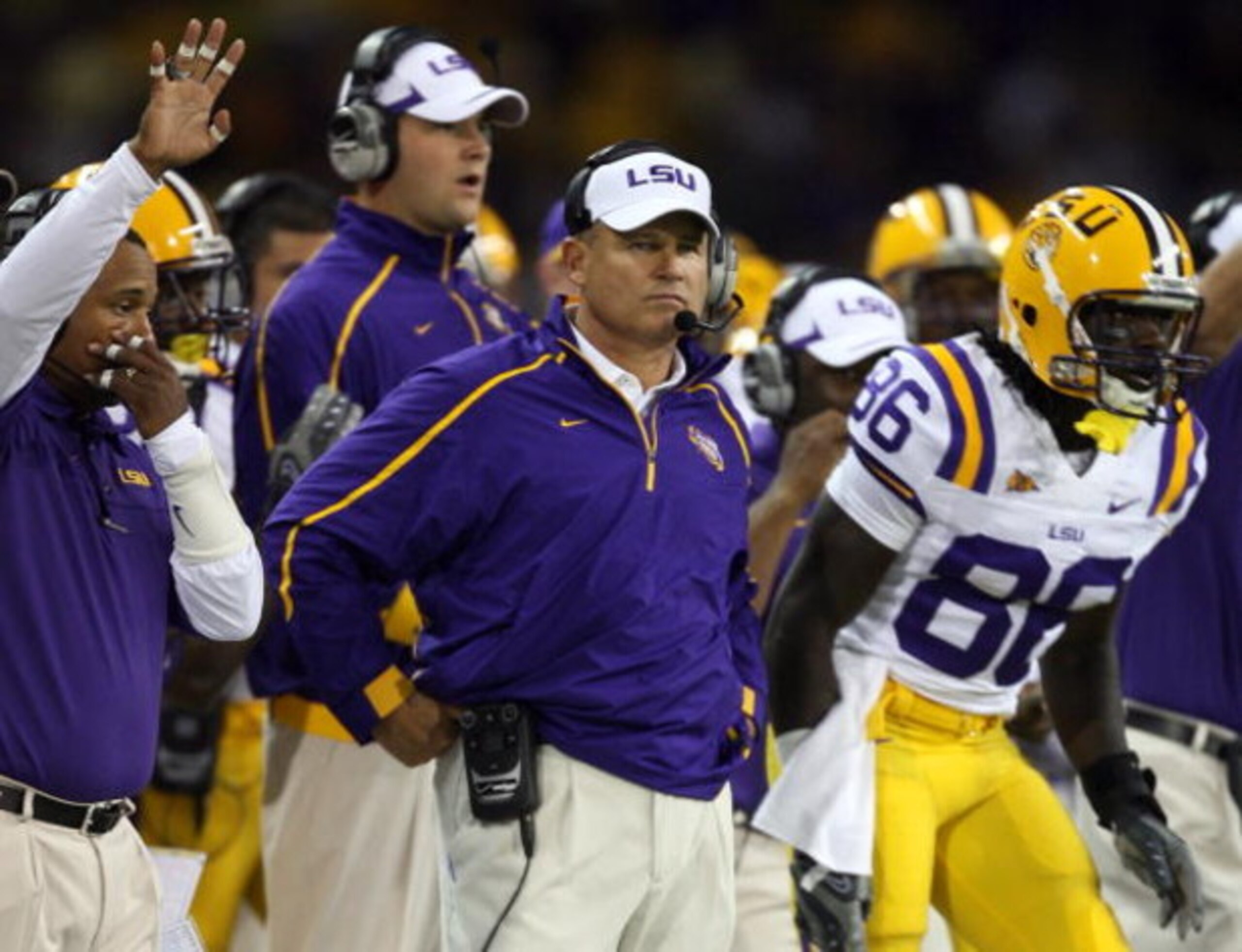SEATTLE - SEPTEMBER 5: Head coach Les Miles of the LSU Tigers looks on from the sideline during their game against the Washington Huskies on September 5, 2009 at Husky Stadium in Seattle, Washington. The LSU Tigers defeated the Washington Huskies 31-23. SEATTLE - SEPTEMBER 5: Head coach Les Miles of the LSU Tigers looks on from the sideline during their game against the Washington Huskies on September 5, 2009 at Husky Stadium in Seattle, Washington. The LSU Tigers defeated the Washington Huskies 31-23.