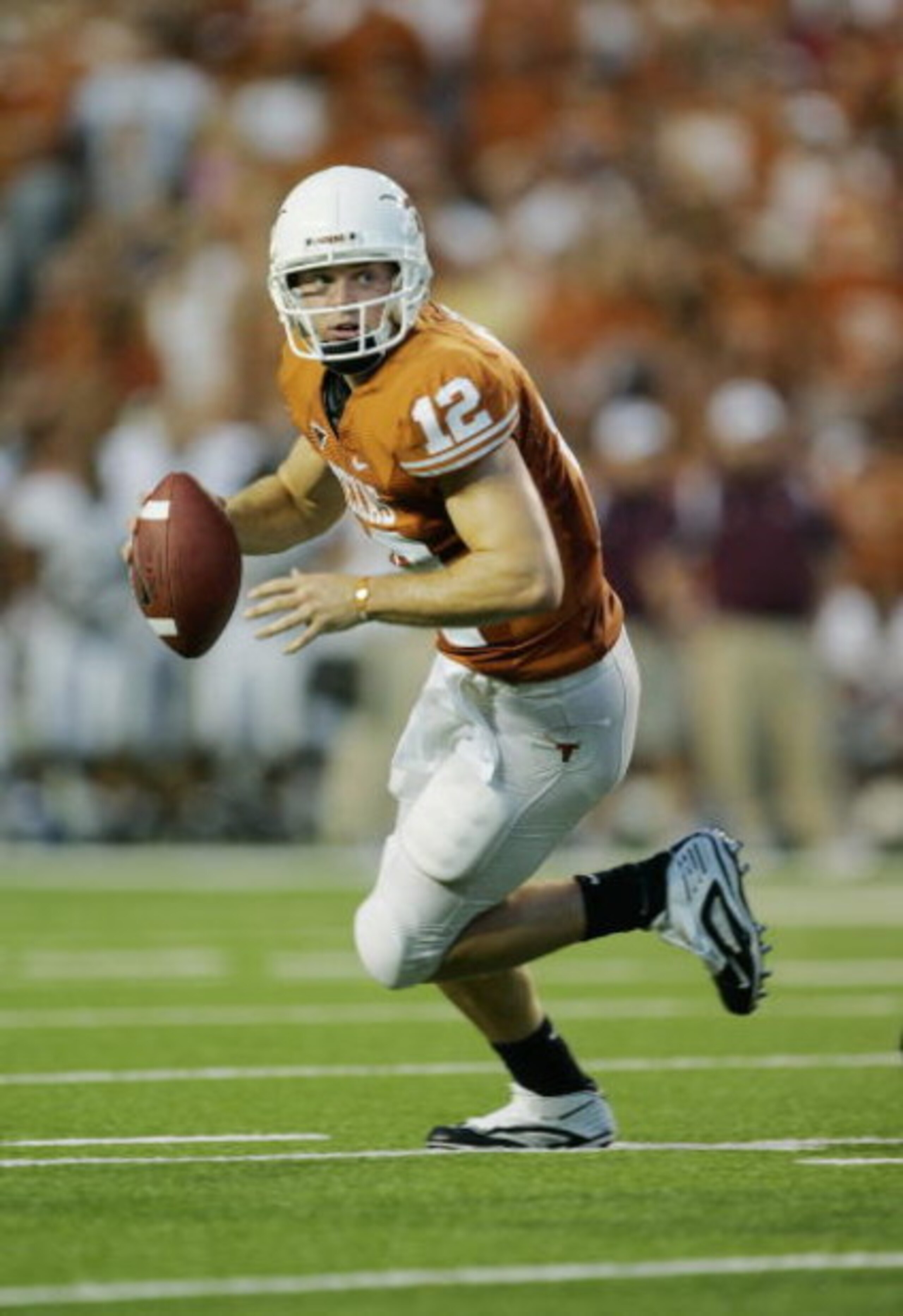 AUSTIN, TX - SEPTEMBER 5: Quarterback Colt McCoy #12 of the Texas Longhorns runs out of the pocket against the Louisiana Monroe Warhawks on September 5, 2009 at Darrell K Royal-Texas Memorial Stadium in Austin, Texas. The Longhorns defeated the Warhawks AUSTIN, TX - SEPTEMBER 5: Quarterback Colt McCoy #12 of the Texas Longhorns runs out of the pocket against the Louisiana Monroe Warhawks on September 5, 2009 at Darrell K Royal-Texas Memorial Stadium in Austin, Texas. The Longhorns defeated the Warhawks