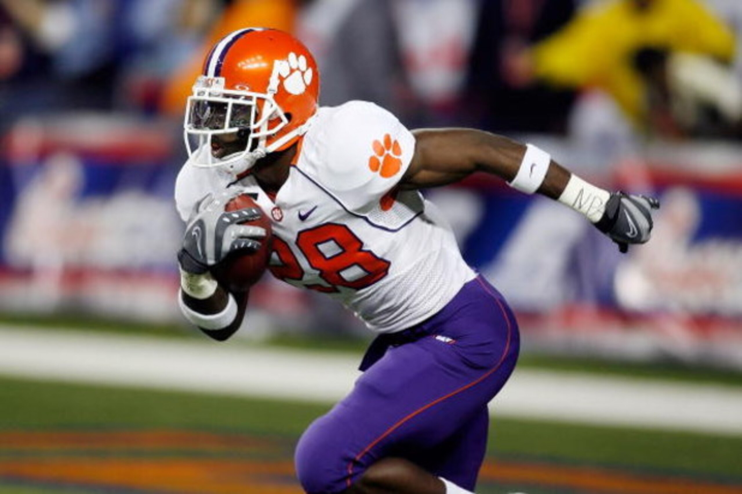 ATLANTA - DECEMBER 31:  C.J. Spiller #28 of the Clemson University Tigers runs down the field during the Chick-Fil-A Bowl on December 31, 2007 at the Georgia Dome in Atlanta, Georgia.  (Photo by Chris Graythen/Getty Images)