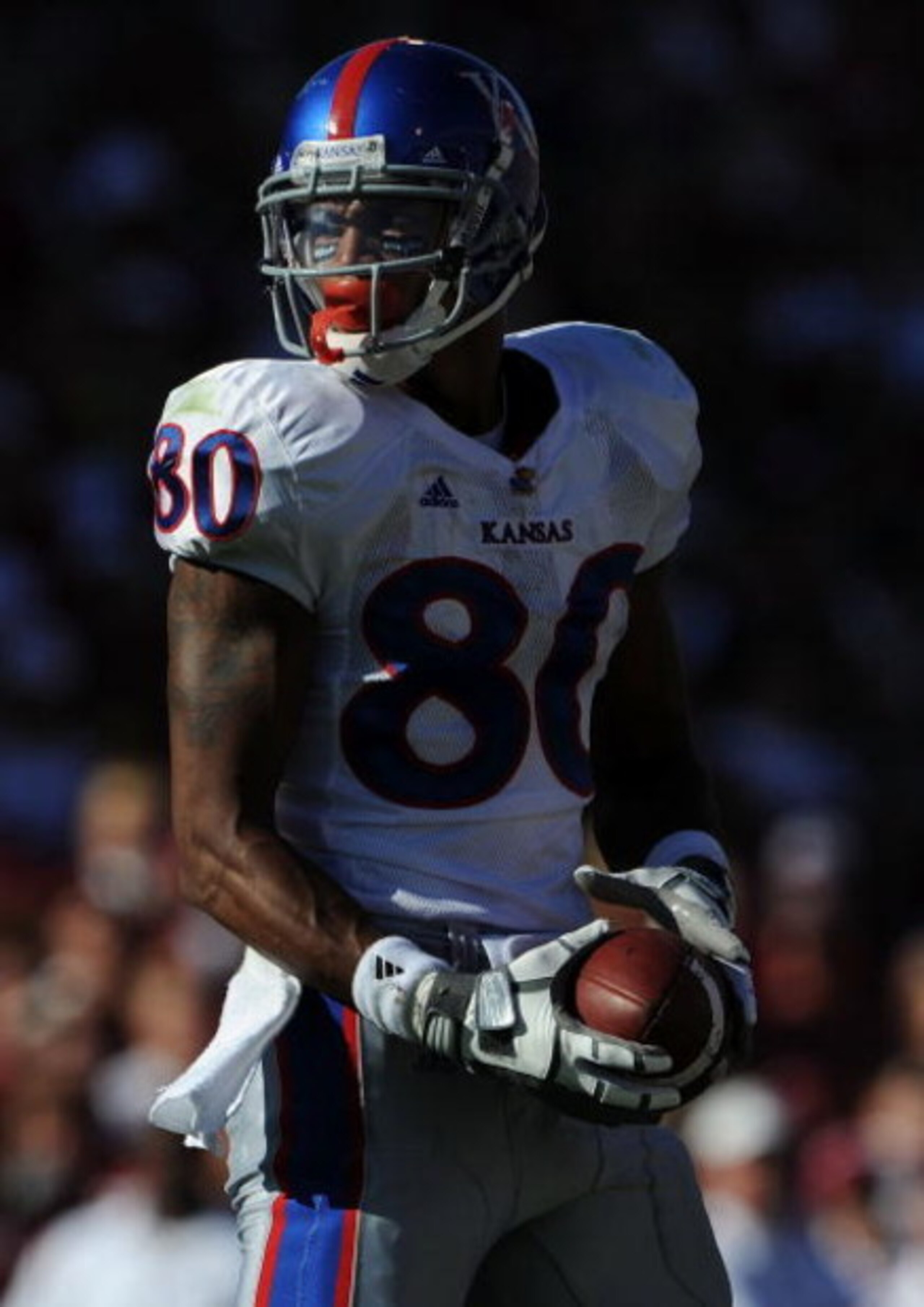 NORMAN, OK - OCTOBER 18:  Wide receiver Dezmon Briscoe #80 of the Kansas Jayhawks during play against the Oklahoma Sooners at Memorial Stadium on October 18, 2008 in Norman, Oklahoma.  (Photo by Ronald Martinez/Getty Images)