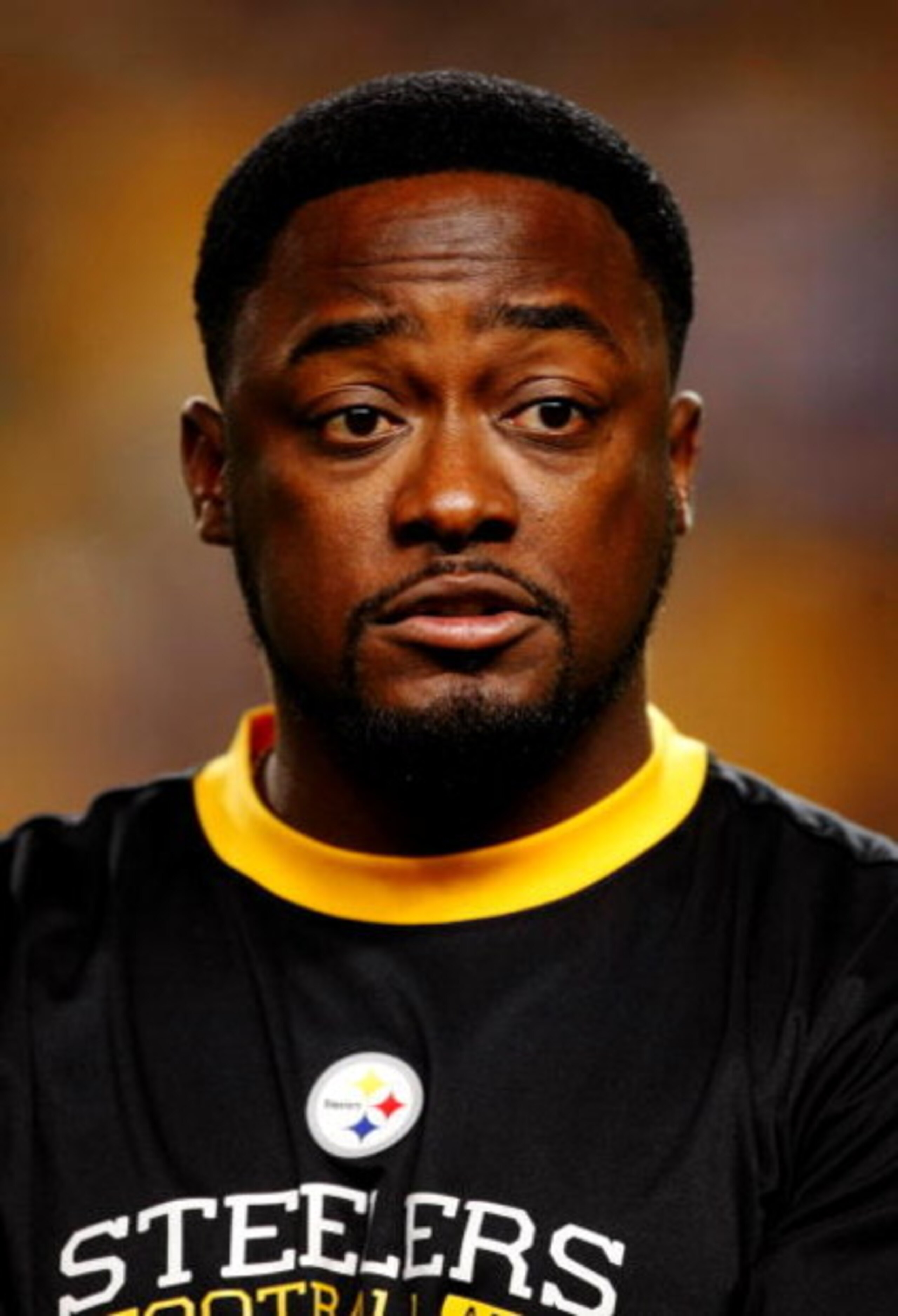 PITTSBURGH - SEPTEMBER 10:  Head coach Mike Tomlin of the Pittsburgh Steelers watches his team warm up before the start of the NFL season opener against the Tennessee Titans at Heinz Field on September 10, 2009 in Pittsburgh, Pennsylvania.(Photo by Scott 