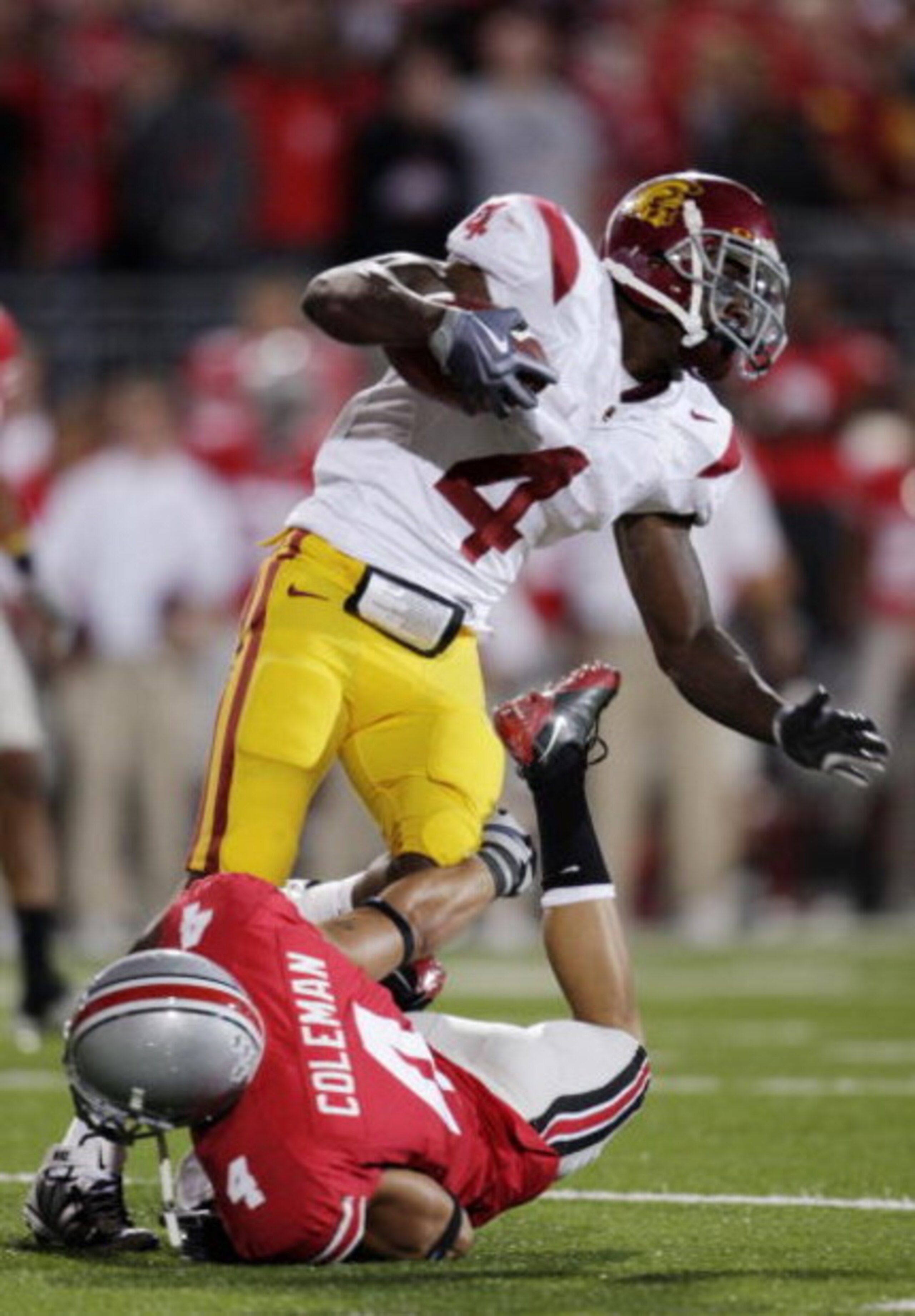 COLUMBUS, OH - SEPTEMBER 12:  Joe McKnight #4 of the USC Trojans complets a pass in the fourth quarter of the game against the Ohio State Buckeyes at Ohio Stadium on September 12, 2009 in Columbus, Ohio. USC won the game 18-15. (Photo by Andy Lyons/Getty 