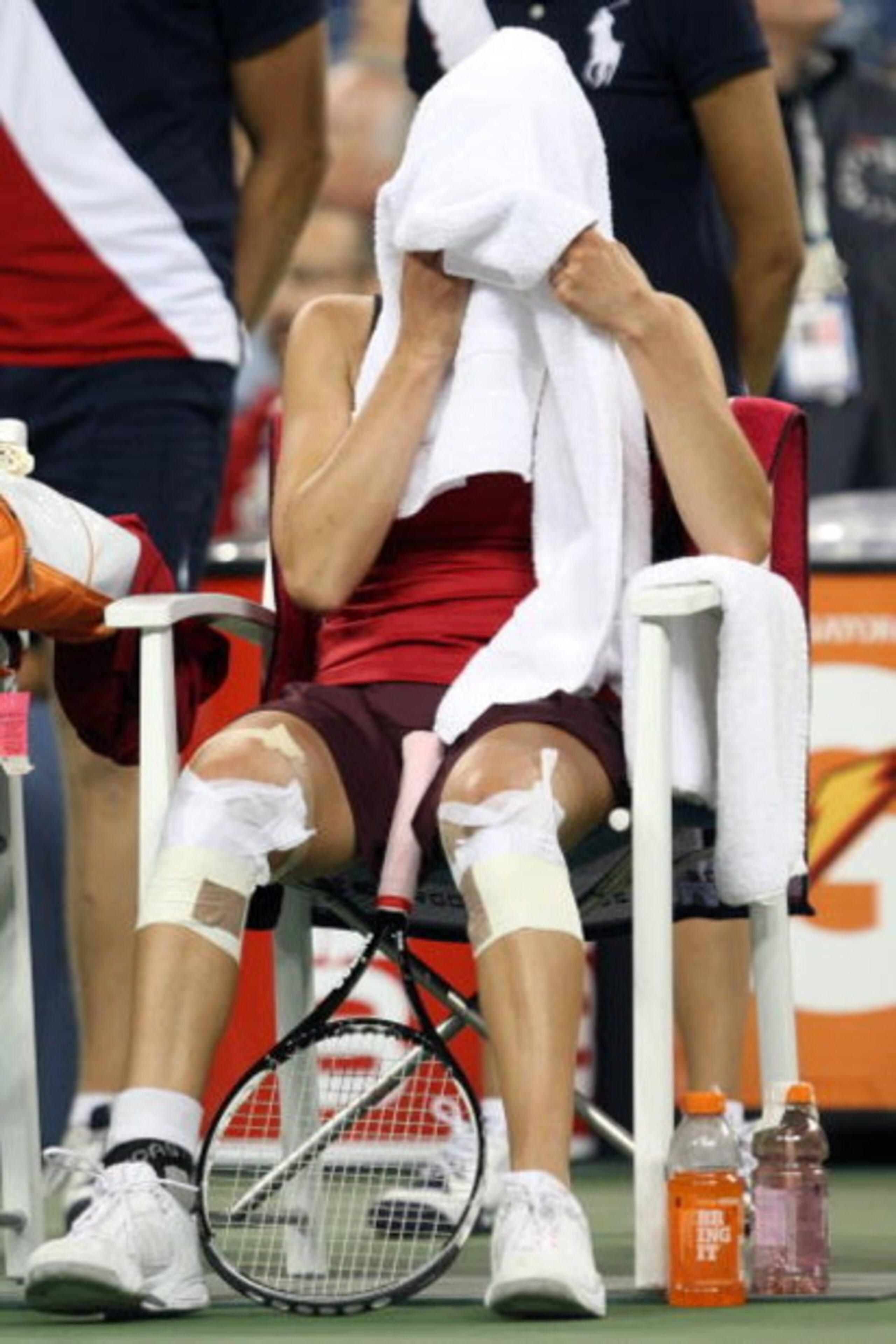 NEW YORK - SEPTEMBER 06: Vera Zvonareva of Russia sits on her bench with a towel on her head during a break in play against Flavia Pennetta of Italy during day seven of the 2009 U.S. Open at the USTA Billie Jean King National Tennis Center on September 6 NEW YORK - SEPTEMBER 06: Vera Zvonareva of Russia sits on her bench with a towel on her head during a break in play against Flavia Pennetta of Italy during day seven of the 2009 U.S. Open at the USTA Billie Jean King National Tennis Center on September 6