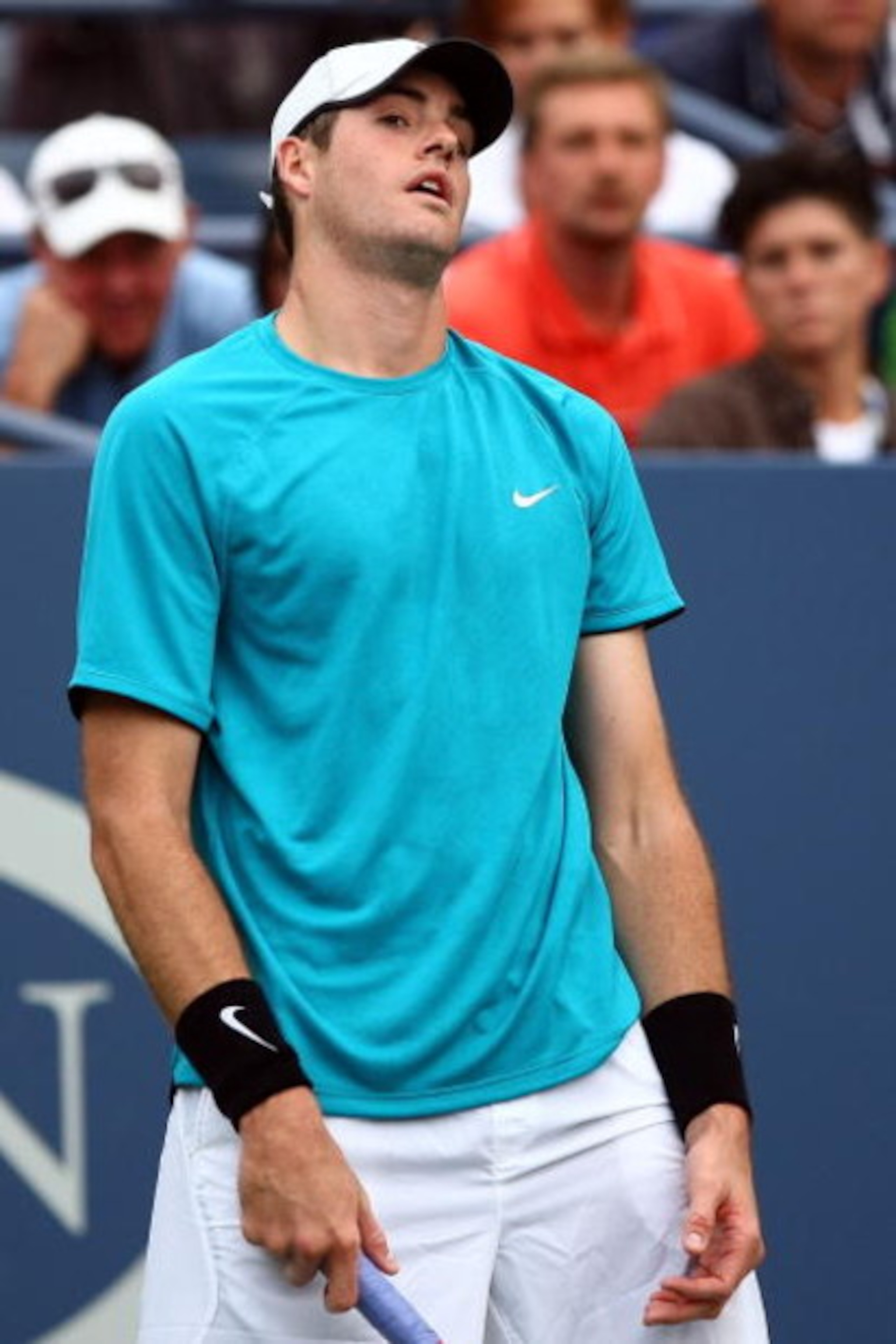 NEW YORK - SEPTEMBER 07: John Isner reacts after a play against Fernando Verdasco of Spain during day eight of the 2009 U.S. Open at the USTA Billie Jean King National Tennis Center on September 7, 2009 in the Flushing neighborhood of the Queens borough NEW YORK - SEPTEMBER 07: John Isner reacts after a play against Fernando Verdasco of Spain during day eight of the 2009 U.S. Open at the USTA Billie Jean King National Tennis Center on September 7, 2009 in the Flushing neighborhood of the Queens borough