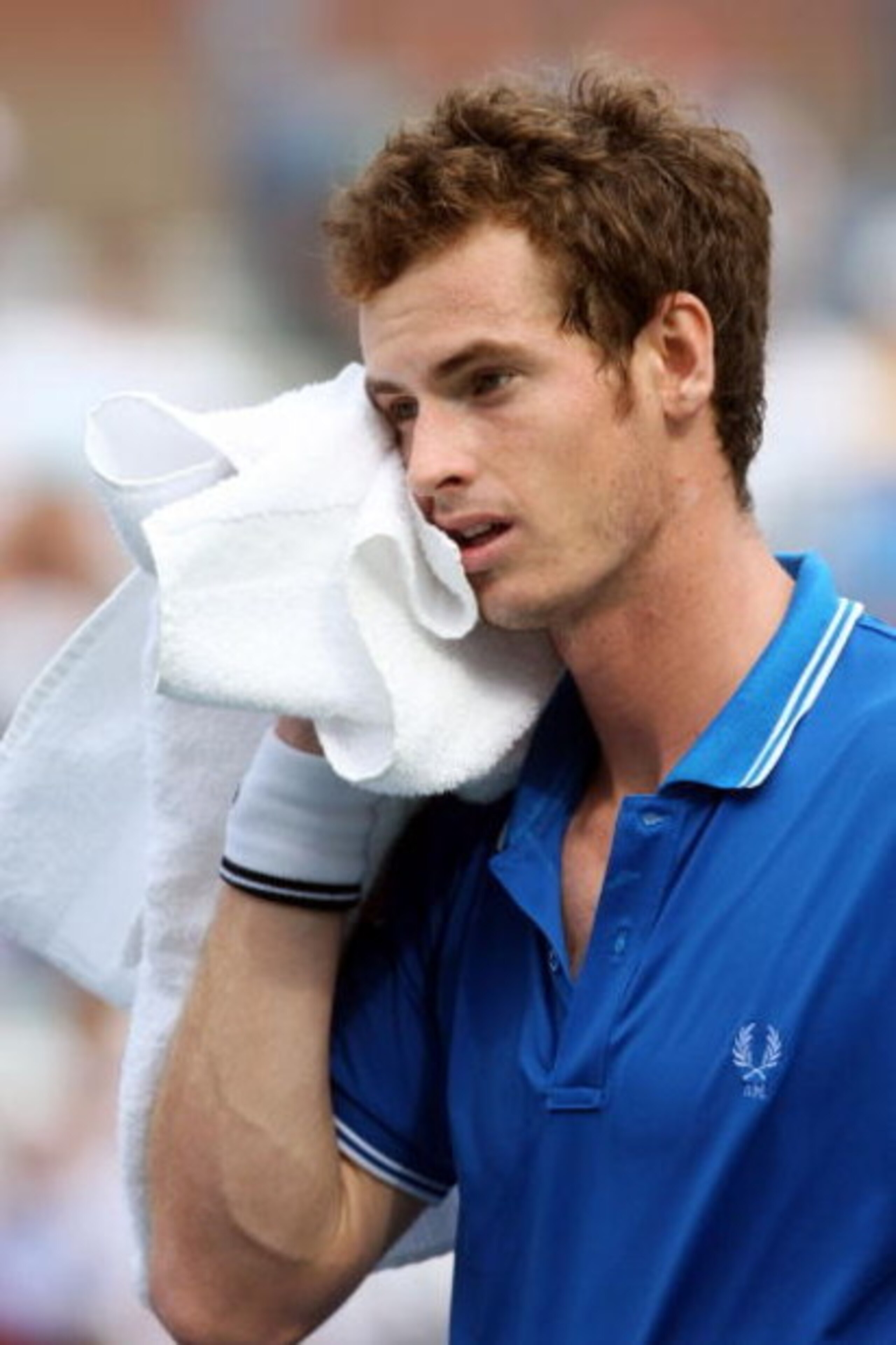 NEW YORK - SEPTEMBER 08: Andy Murray of Great Britain wipes his face during his match against Marin Cilic of Croatia during day nine of the 2009 U.S. Open at the USTA Billie Jean King National Tennis Center on September 8, 2009 in the Flushing neighborho NEW YORK - SEPTEMBER 08: Andy Murray of Great Britain wipes his face during his match against Marin Cilic of Croatia during day nine of the 2009 U.S. Open at the USTA Billie Jean King National Tennis Center on September 8, 2009 in the Flushing neighborho