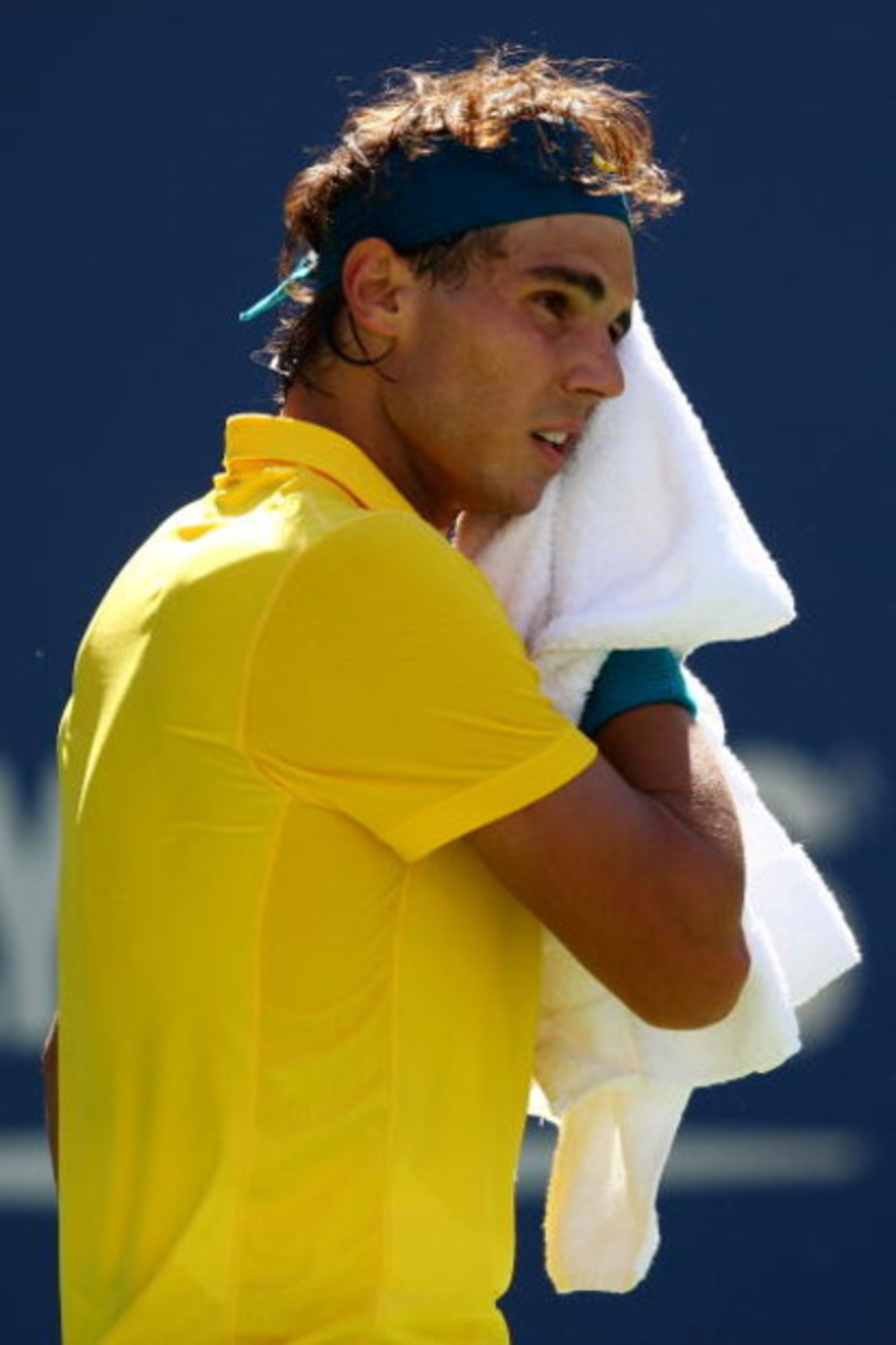 NEW YORK - SEPTEMBER 13: Rafael Nadal of Spain wipes his brow during the Men�s Singles Semifinal match against Juan Martin Del Potro of Argentina on day fourteen of the 2009 U.S. Open at the USTA Billie Jean King National Tennis Center on September 13, 2 NEW YORK - SEPTEMBER 13: Rafael Nadal of Spain wipes his brow during the Men�s Singles Semifinal match against Juan Martin Del Potro of Argentina on day fourteen of the 2009 U.S. Open at the USTA Billie Jean King National Tennis Center on September 13, 2