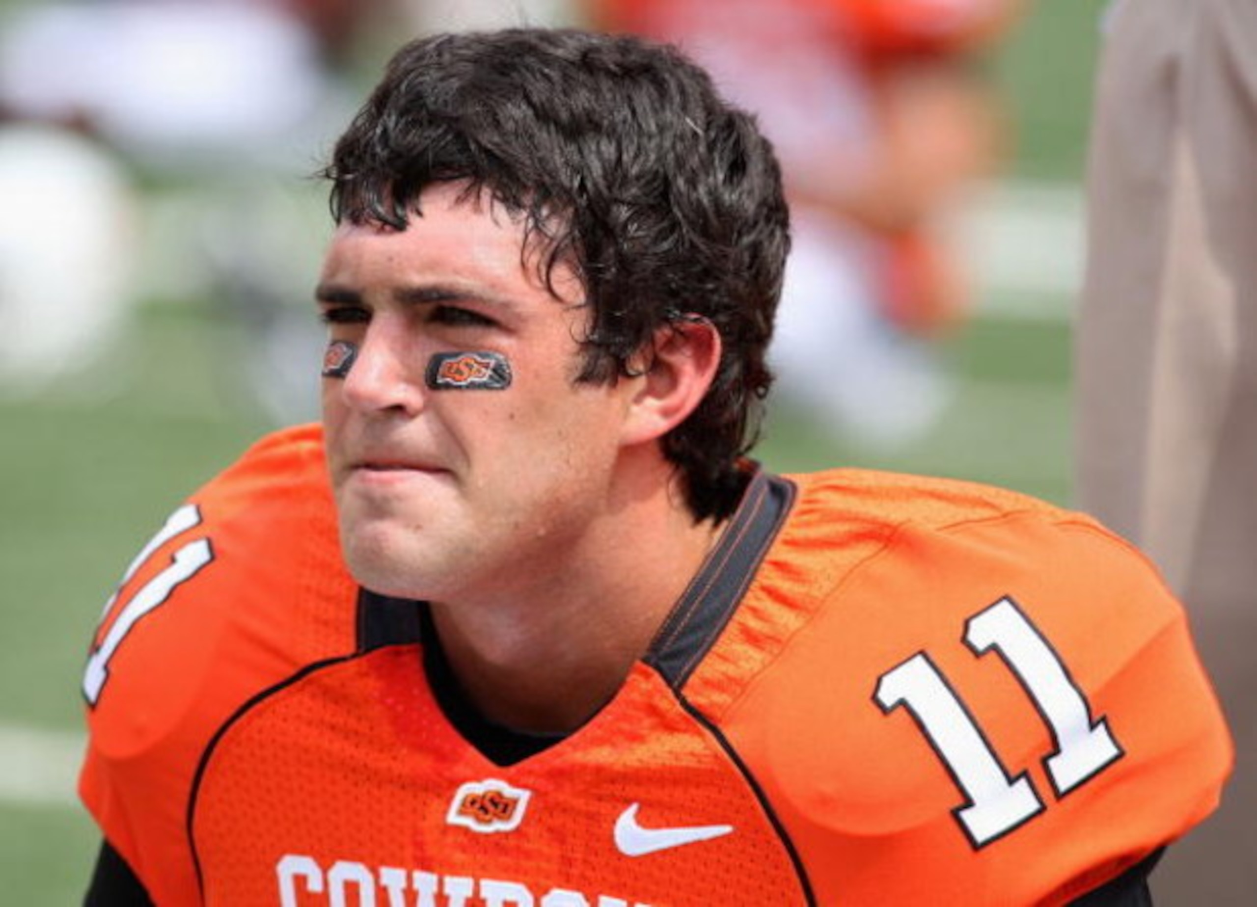 STILLWATER, OK - SEPTEMBER 05:  Quarterback Zac Robinson #11 of the Oklahoma State Cowboys warms up before the college football game against the Georgia Bulldogs at Boone Pickens Stadium on September 5, 2009 in Stillwater, Oklahoma.  The Cowboys defeated 