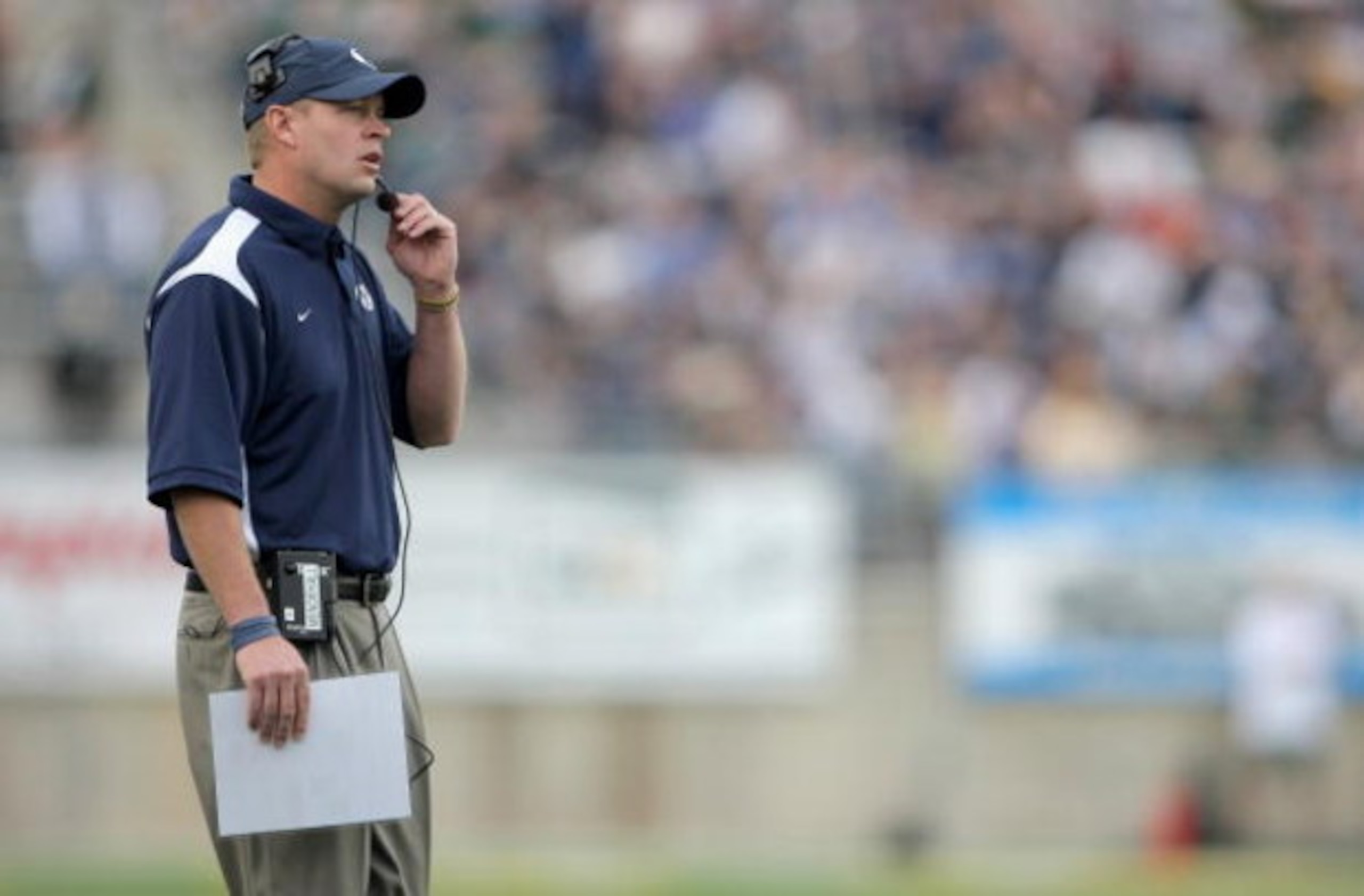 FORT COLLINS, CO - NOVEMBER 01:  Head coach Bronco Mendenhall of the Brigham Young Cougars directs his team against the Colorado State Rams at Sonny Lubick Field at Hughes Stadium on November 1, 2008 in Fort Collins, Colorado. BYU defeated CSU 45-42.  (Ph