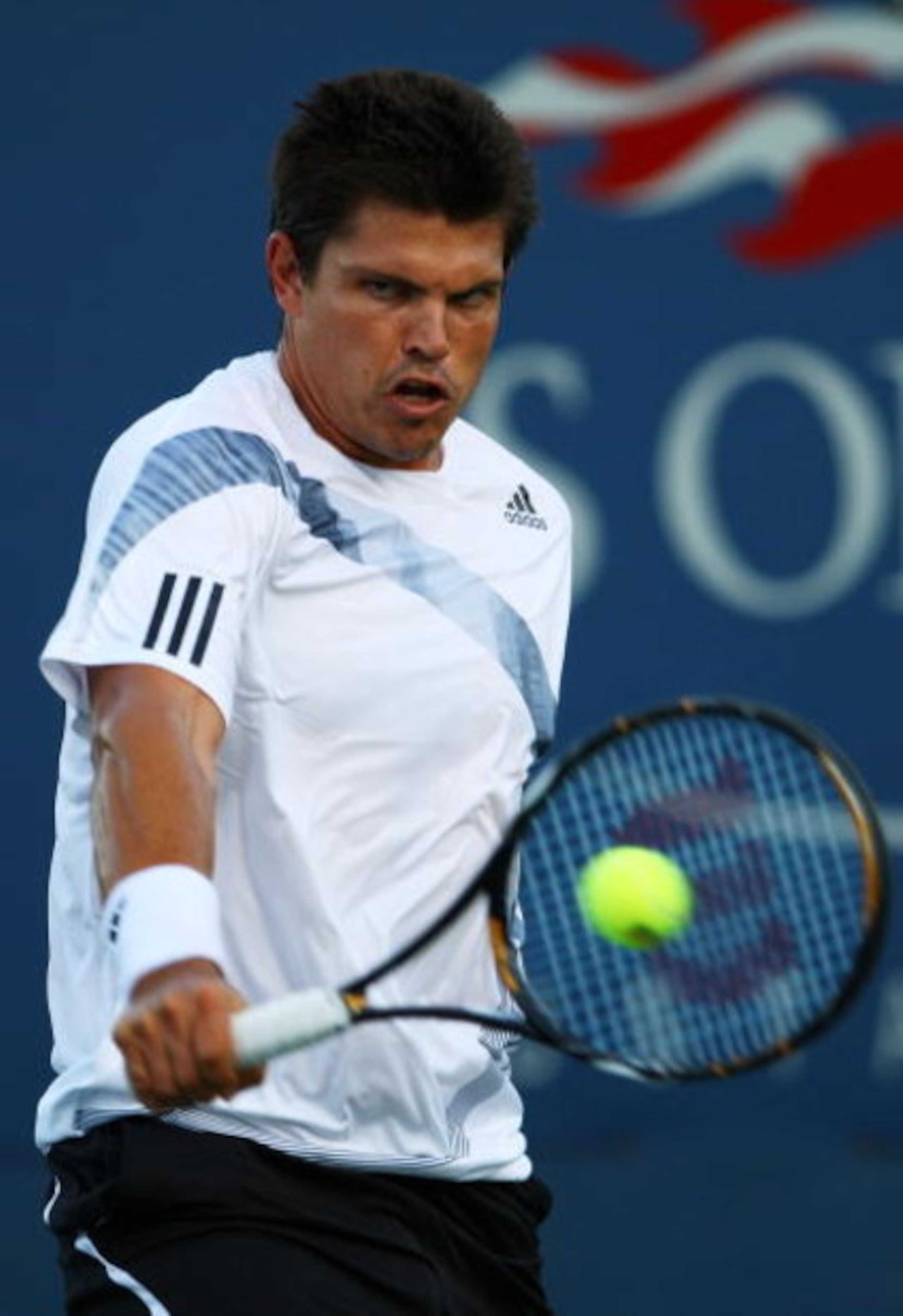 NEW YORK - SEPTEMBER 01:  Taylor Dent of the United States returns a shot against Feliciano Lopez of Spain during day two of the 2009 U.S. Open at the USTA Billie Jean King National Tennis Center on September 1, 2009 in Flushing neighborhood of the Queens
