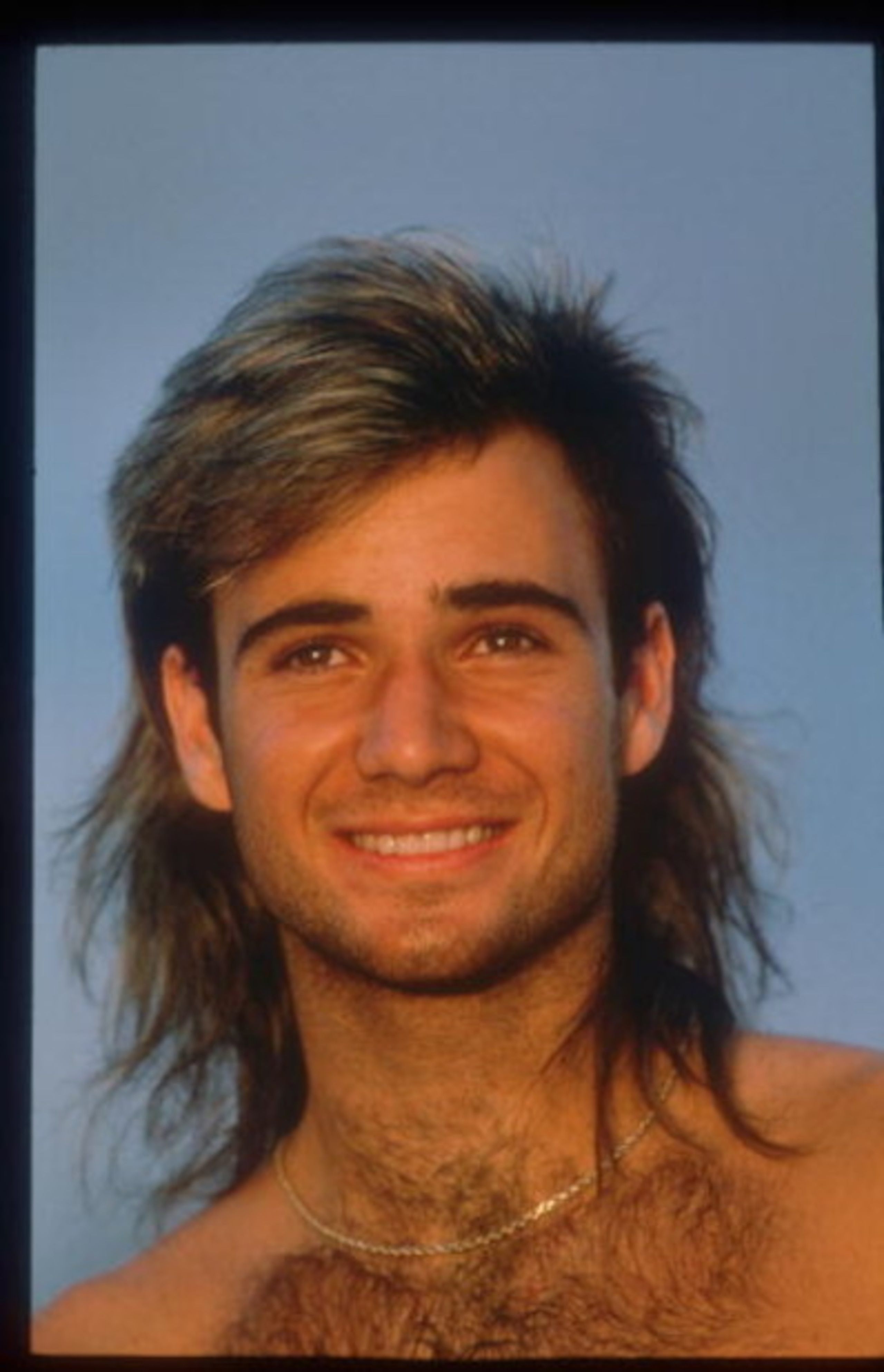 82719 01: Tennis Player Andre Agassi Smiles June 1990 In Paris, France. Agassi Made His Presence Known In 1987 In The Semifinals In Stratton Mountain And Went On To Win Several Titles Including His First Grand Slam Final At The French Open.  (Photo By Joh