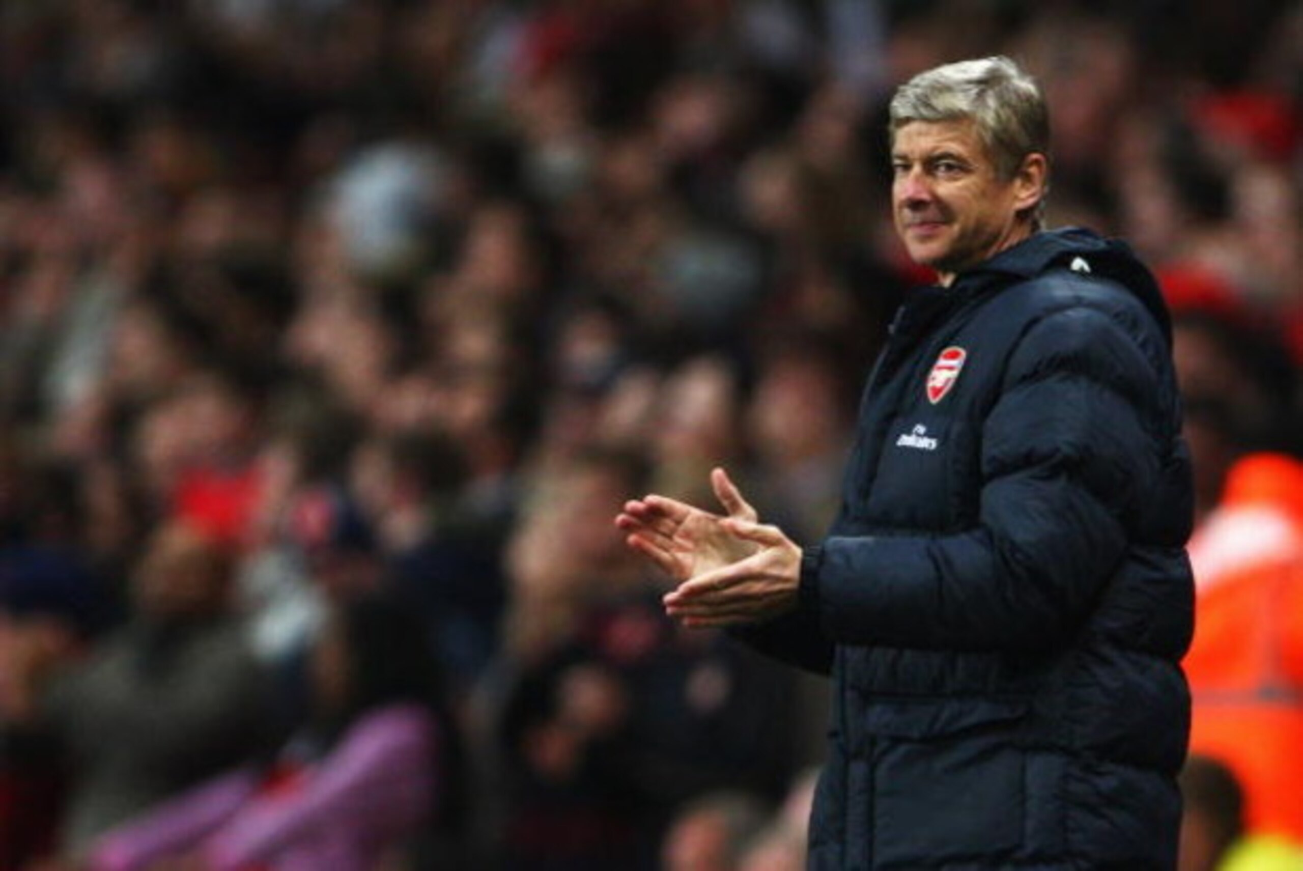 LONDON - SEPTEMBER 23: Arsenal manager Arsene Wenger applauds a goal during the Carling Cup Third Round match between Arsenal and Sheffield United at the Emirates Stadium on September 23, 2008 in London, England.  (Photo by Phil Cole/Getty Images)