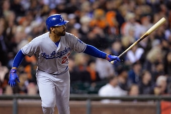 SAN FRANCISCO, CA - SEPTEMBER 24:  Matt Kemp #27 of the Los Angeles Dodgers swings and watches the flight of his ball as he hits a solo home run during the sixth inning against the San Francisco Giants at AT&T Park on September 24, 2013 in San Francisco, 