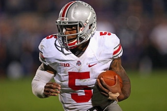 EVANSTON, IL - OCTOBER 05:  Braxton Miller #5 of the Ohio State Buckeyes runs against the Northwestern Wildcats at Ryan Field on October 5, 2013 in Evanston, Illinois. Ohio State defeated Northwestern 40-30. Photo by Jonathan Daniel/Getty Images)  (Photo 