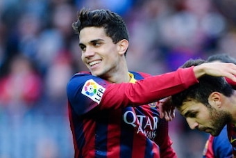 BARCELONA, SPAIN - NOVEMBER 23: Cesc Fabregas (C) of FC Barcelona celebrates with his teammates Marc Bartra (L) and Neymar after scoring his team's second goal from the penalty spot during the La Liga match between FC Barcelona and Granda CF at Camp Nou BARCELONA, SPAIN - NOVEMBER 23: Cesc Fabregas (C) of FC Barcelona celebrates with his teammates Marc Bartra (L) and Neymar after scoring his team's second goal from the penalty spot during the La Liga match between FC Barcelona and Granda CF at Camp Nou