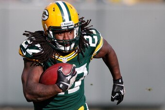 GREEN BAY, WI - NOVEMBER 10:  Eddie Lacy #27 of the Green Bay Packers looks up field during a third quarter run while playing the Philadelphia Eagles at Lambeau Field on November 10, 2013 in Green Bay, Wisconsin. (Photo by Gregory Shamus/Getty Images)