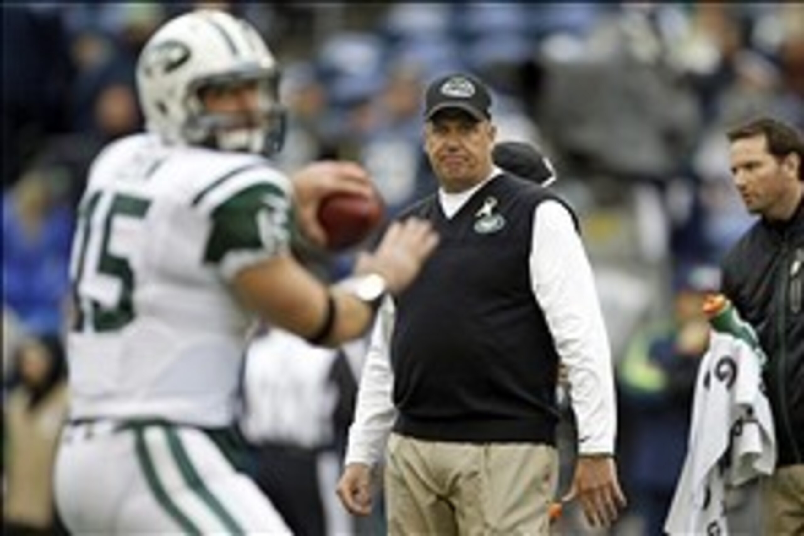 Nov 11, 2012; Seattle, WA, USA; New York Jets head coach Rex Ryan observes pre game warmups by New York Jets quarterback Tim Tebow (15) against the Seattle Seahawks at CenturyLink Field. Mandatory Credit: Joe Nicholson-USA TODAY Sports Nov 11, 2012; Seattle, WA, USA; New York Jets head coach Rex Ryan observes pre game warmups by New York Jets quarterback Tim Tebow (15) against the Seattle Seahawks at CenturyLink Field. Mandatory Credit: Joe Nicholson-USA TODAY Sports