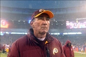Dec 29, 2013; East Rutherford, NJ, USA; Washington Redskins head coach Mike Shanahan walks off the field after a game against the New York Giants at MetLife Stadium. The Giants defeated the Redskins 20-6. Mandatory Credit: Brad Penner-USA TODAY Sports