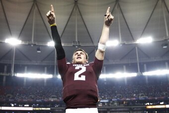 ATLANTA, GA - DECEMBER 31: Johnny Manziel #2 of the Texas A&M Aggies reacts late in the game against the Duke Blue Devils during the Chick-fil-A Bowl at the Georgia Dome on December 31, 2013 in Atlanta, Georgia. Texas A&M won the game 52-48. (Photo by Joe