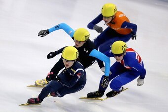 SHANGHAI, CHINA - SEPTEMBER 26:  Park Seung-Hi of korea (Front), Alyson Dudek of United States (Center Left), Charlotte Gilmartin of Great Britain (Center Right) and Lara Van Ruijven of Netherlands (Top) compete in the Women's 500m Preliminaries during da