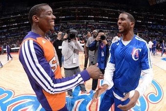 LOS ANGELES, CA - DECEMBER 30: Eric Bledsoe #2 of the Phoenix Suns and Chris Paul #3 of the Los Angeles Clippers converse before a game at STAPLES Center on December 30, 2013 in Los Angeles, California. NOTE TO USER: User expressly acknowledges and agrees