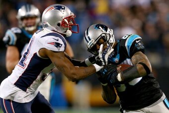 CHARLOTTE, NC - NOVEMBER 18: Aqib Talib #31 of the New England Patriots tackles Steve Smith #89 of the Carolina Panthers during their game at Bank of America Stadium on November 18, 2013 in Charlotte, North Carolina. (Photo by Streeter Lecka/Getty Imag CHARLOTTE, NC - NOVEMBER 18: Aqib Talib #31 of the New England Patriots tackles Steve Smith #89 of the Carolina Panthers during their game at Bank of America Stadium on November 18, 2013 in Charlotte, North Carolina. (Photo by Streeter Lecka/Getty Imag