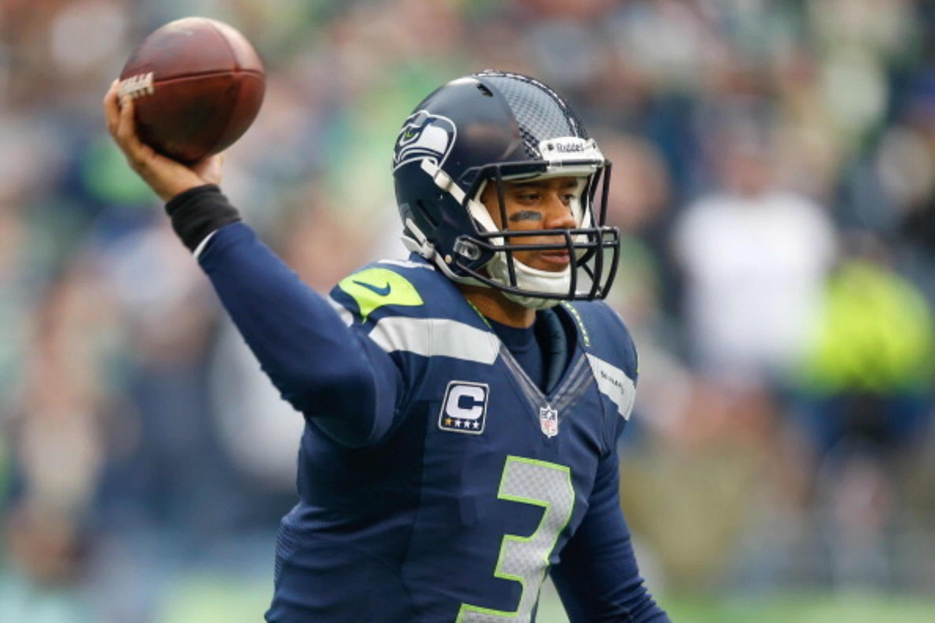 SEATTLE, WA - DECEMBER 29:  Quarterback Russell Wilson #3 of the Seattle Seahawks passes against the St. Louis Rams at CenturyLink Field on December 29, 2013 in Seattle, Washington. The Seahawks defeated the Rams 27-9.  (Photo by Otto Greule Jr/Getty Imag