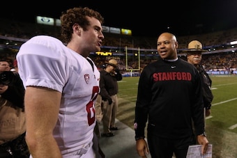 TEMPE, AZ - DECEMBER 07:  Head coach David Shaw of the Stanford Cardinal talks with quarterback Kevin Hogan #8 in the final moments of the Pac 12 Championship game against the Arizona State Sun Devils at Sun Devil Stadium on December 7, 2013 in Tempe, Ari