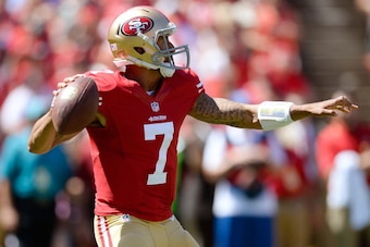SAN FRANCISCO, CA - SEPTEMBER 08:  Colin Kaepernick #7 of the San Francisco 49ers drops back to pass during the first quarter against the Green Bay Packers at Candlestick Park on September 8, 2013 in San Francisco, California.  (Photo by Thearon W. Hender